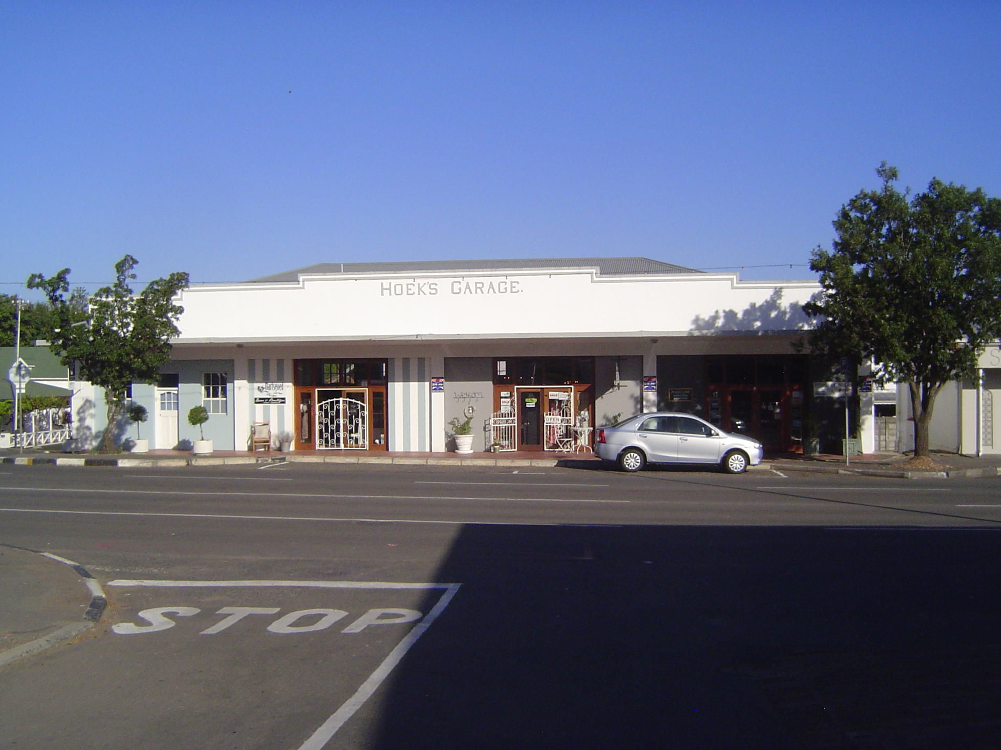Few of these buildings would draw a second glance; here's one that might. The garage is still in business in new space next to the camera.