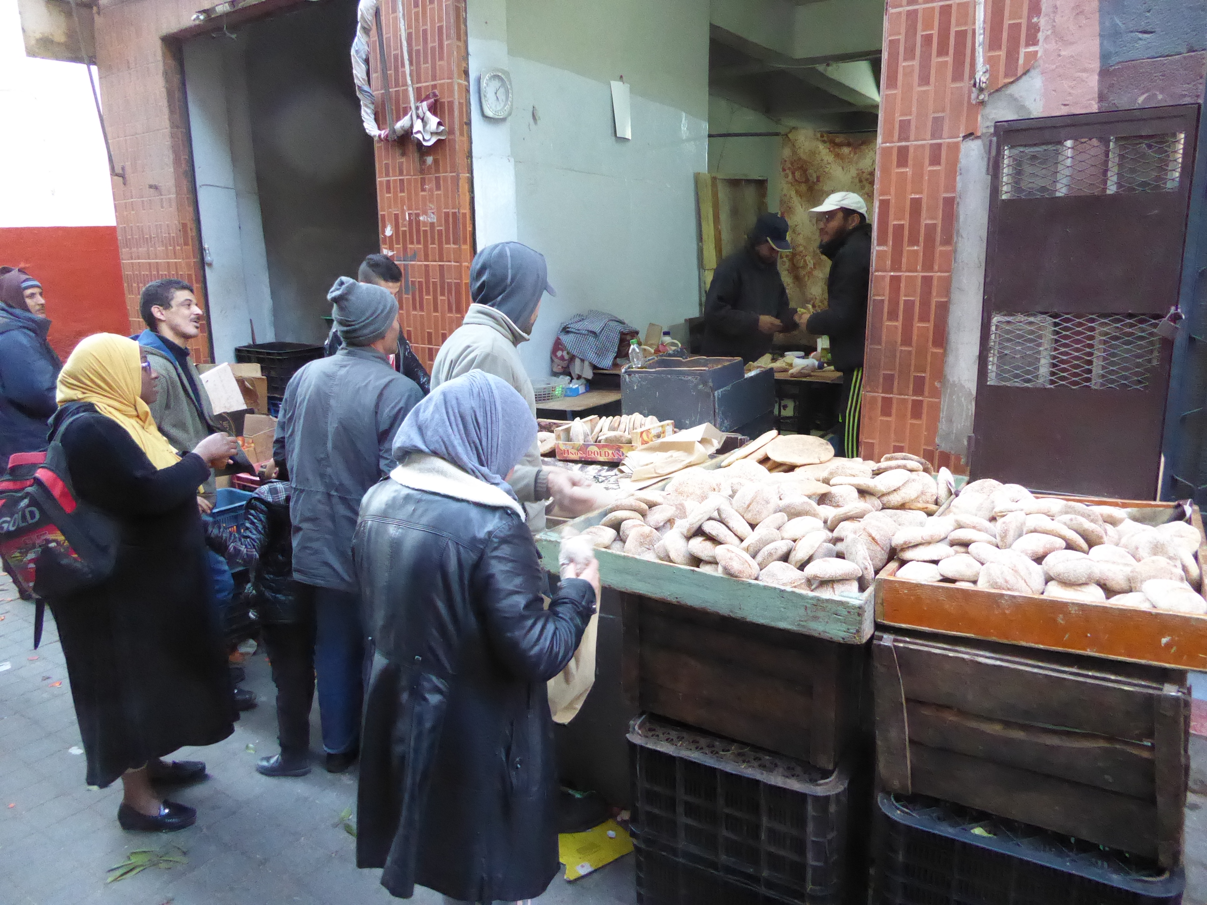 Just around the corner, there's a real baker, a reminder that the old city has its old ways.