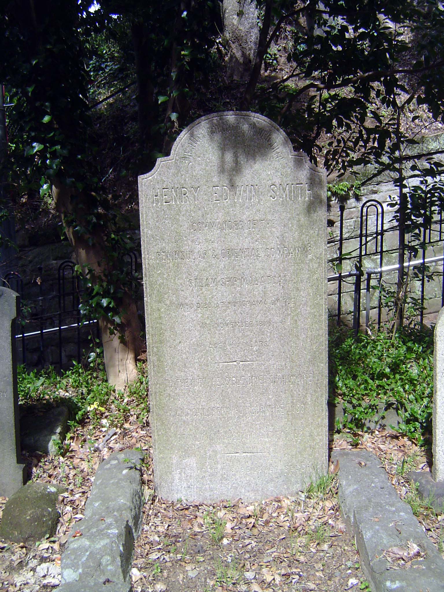 Here Lies Henry Edwin Smith, Commander of the Peninsular and Oriental Company's Steamship Malacca, who died at Yokohoma at the 18th of Decem