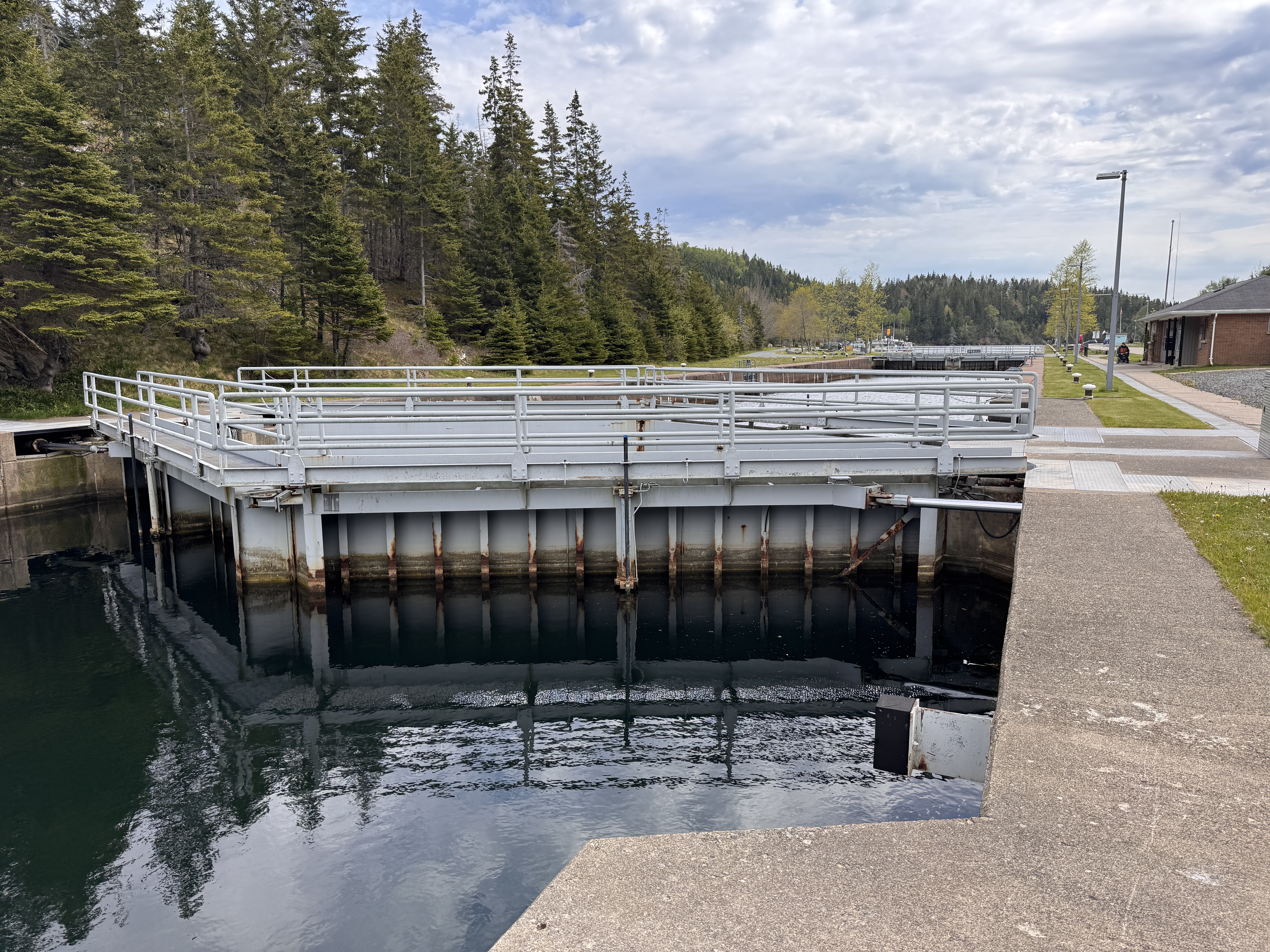 The locks have to deal with tides, which increased when the causeway blocked the natural flow through the strait.