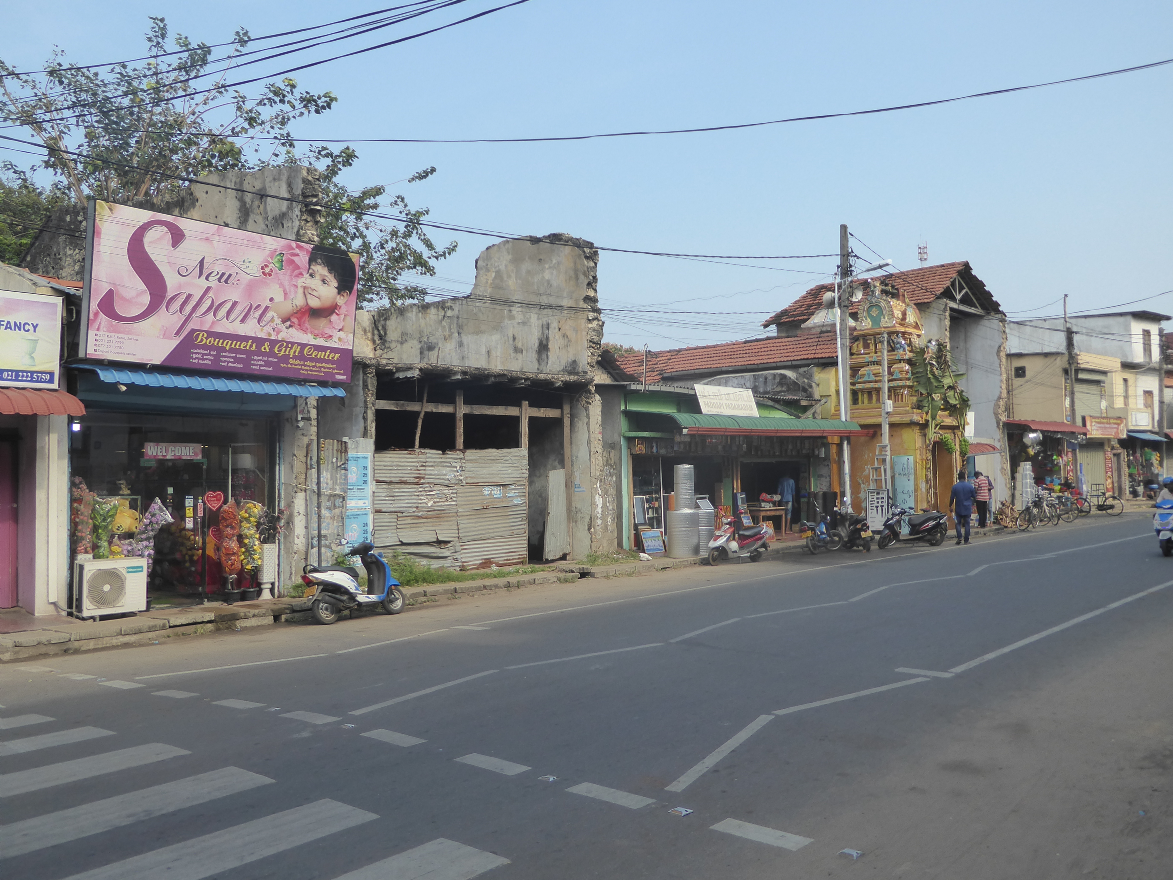 We're on the main road in from the airport and just a block from the intersection with Hospital Road, Jaffna's main street. A temple's been