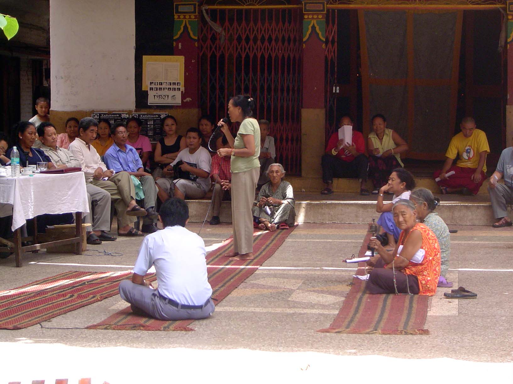 Speech... in Tibetan. One topic on the agenda might have been the plans of the Delhi Development Authority to demolish the colony.