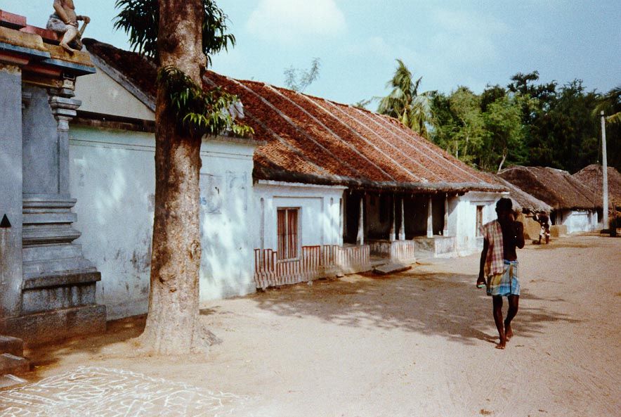 Around the corner, a street with more typical village housing.