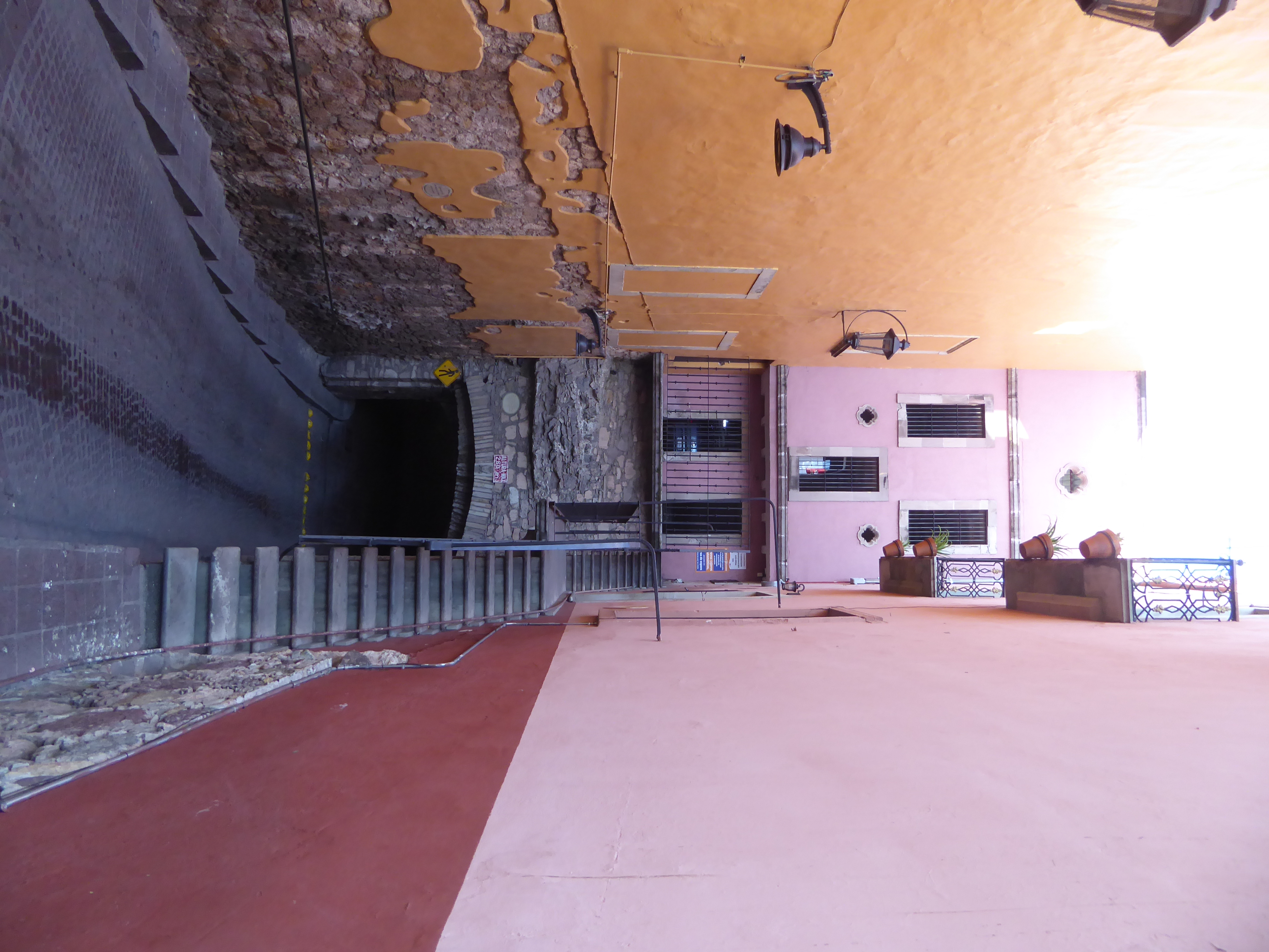 A tunnel rises from under a garage near the Teatro Juárez.