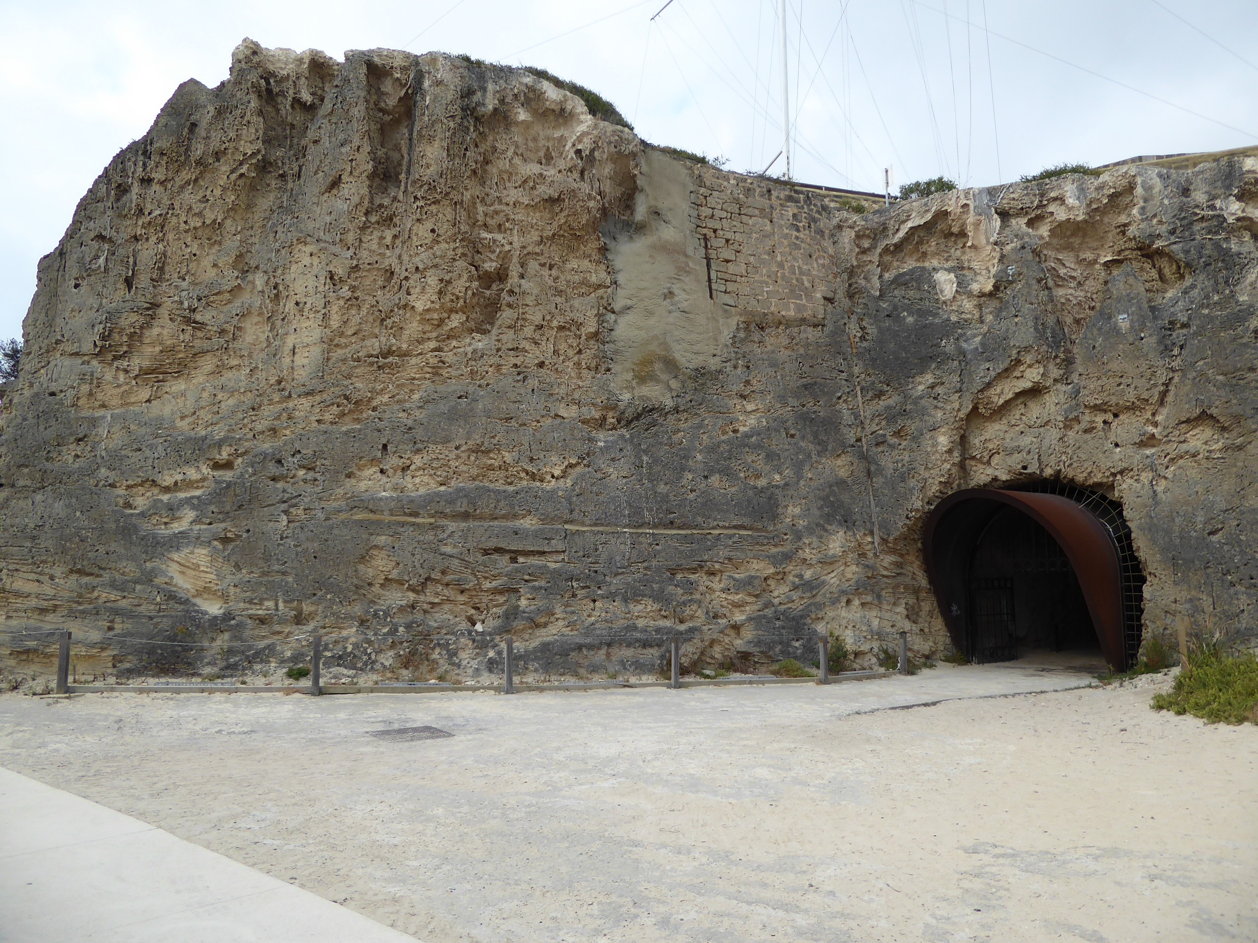 The hill from which the last picture was taken presents a cliff to the beach, but the material is so soft that the whalers cut a tunnel thro