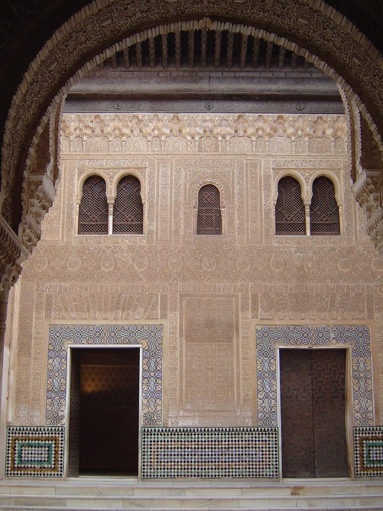 The south wall of the Patio del Cuarto Dorado. This was once the facade of the palace's main entrance. It's hard to make sense of that fact,