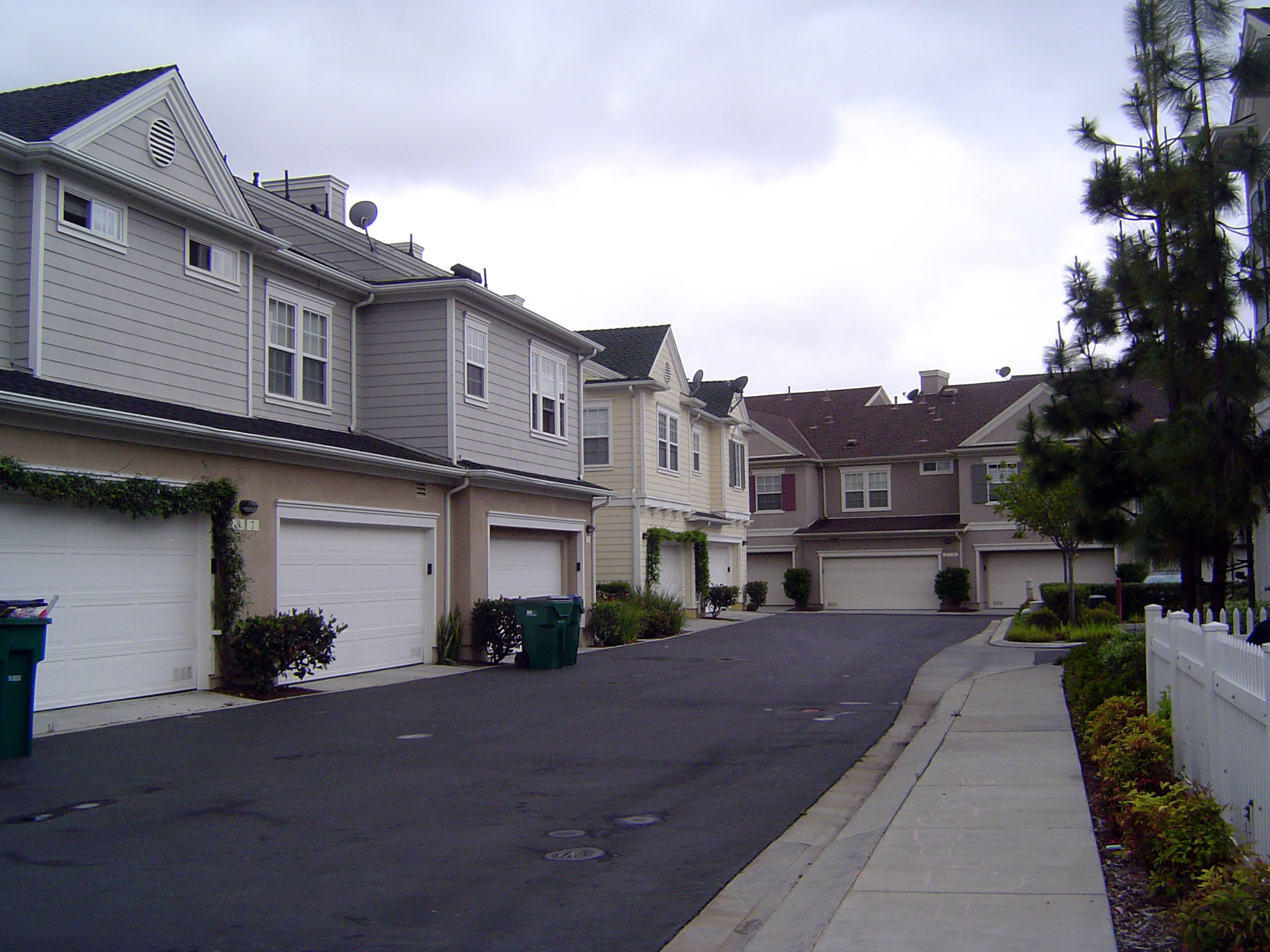 The secret is out back, where even through those garage doors you can hear SUV's growling.