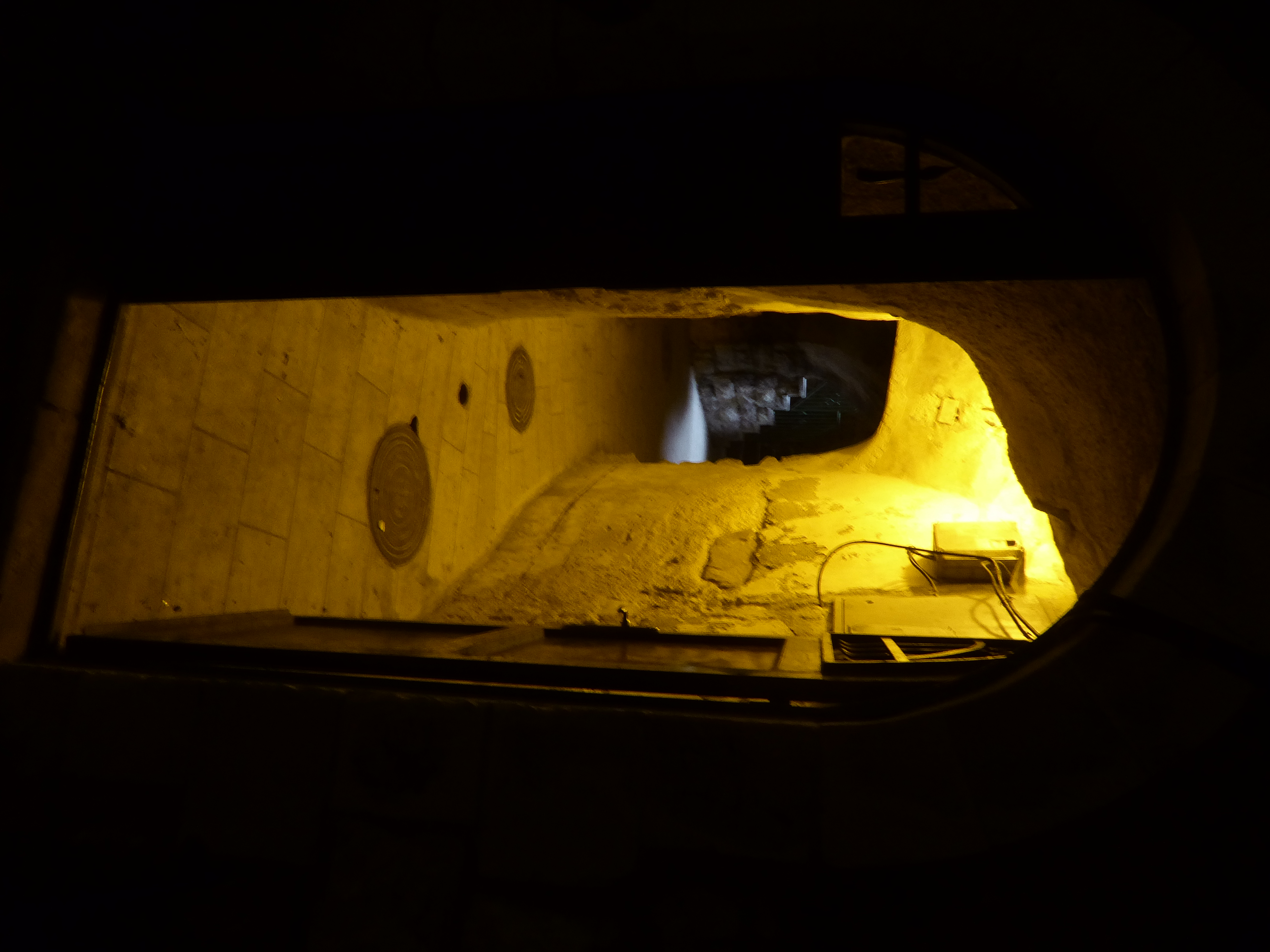 The paths lead to courtyard houses invisible until a door opens. In this case the recent improvements include not only sewer lines but stree