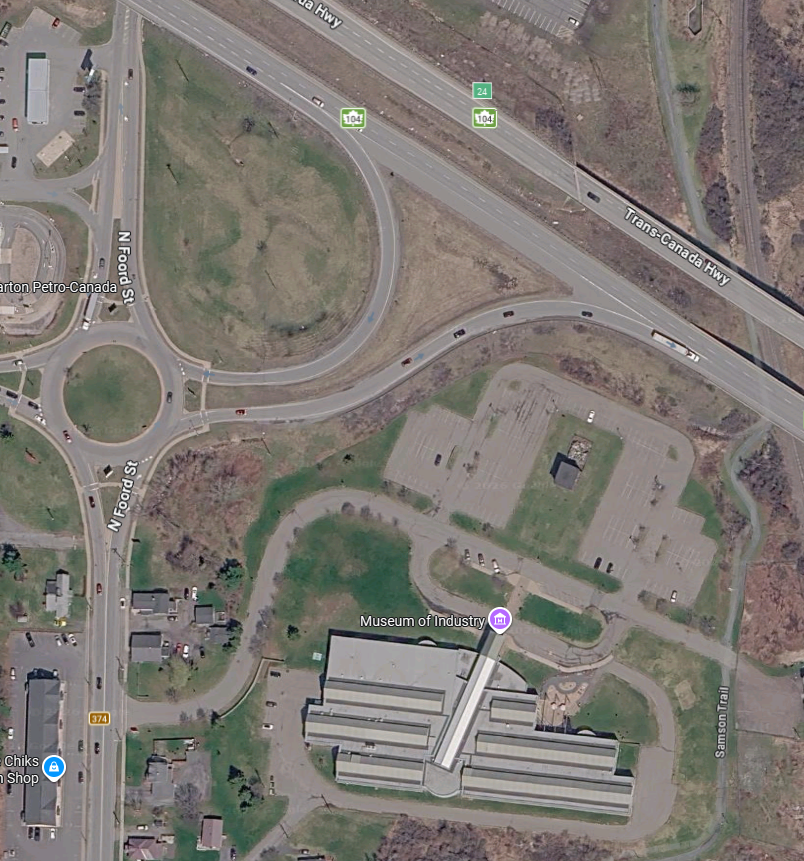 It used to be where the Trans-Canada Highway runs, but it had to get out of the way.  It was taken apart and rebuilt on that rectangle of gr