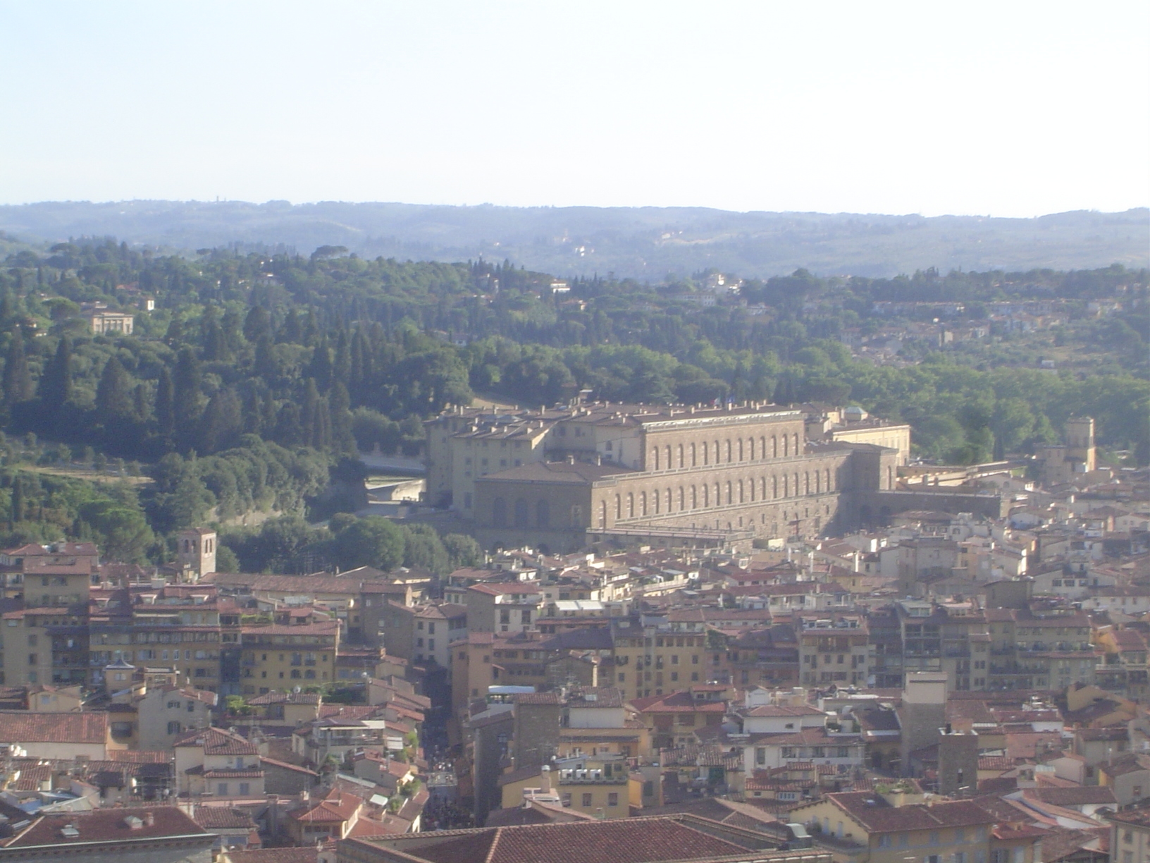A zoomed view of the Pitti Palace; behind it are the Boboli Gardens, which were originally quarries for the hard sandstone—pietra dura—emplo