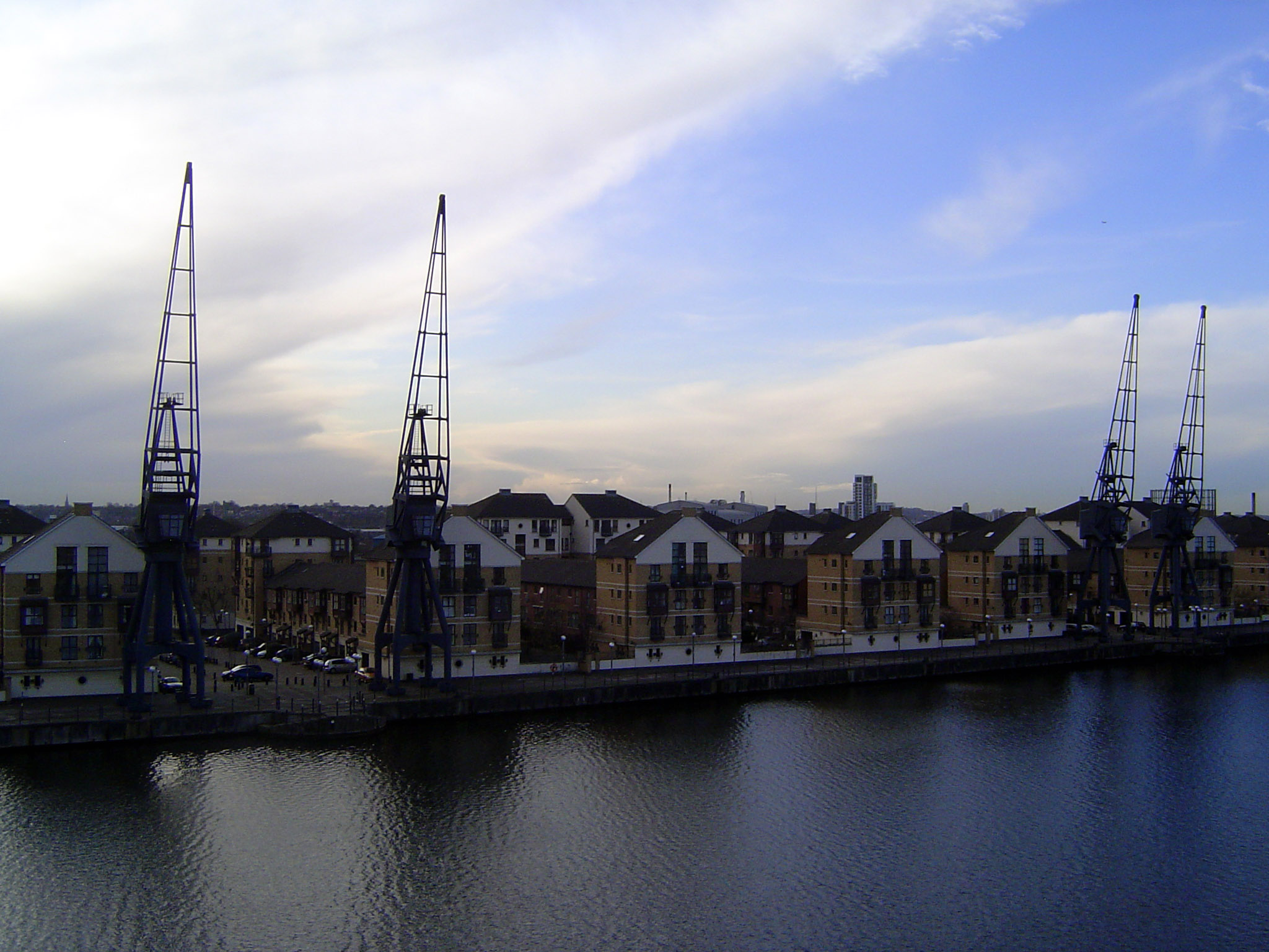 Britannia Village was conceived by the Docklands Corporation in the 1990s as a self-contained community. Again, the cranes are reduced to sc