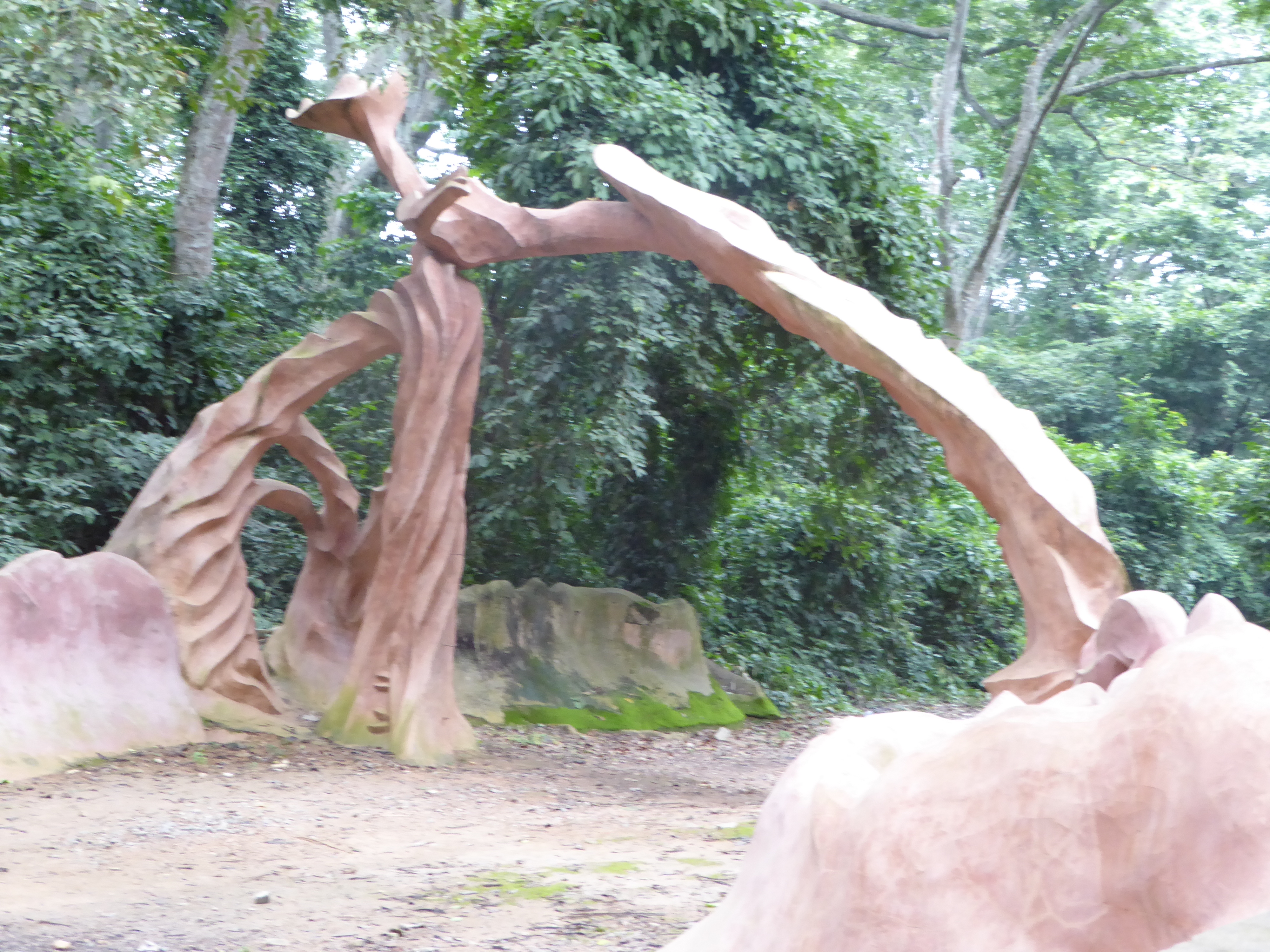 This is the Arch of the Flying Tortoise. It's the main gate into the Ojubo Oshogbo, which is to say the Oshogbo site for prayers. Conceived