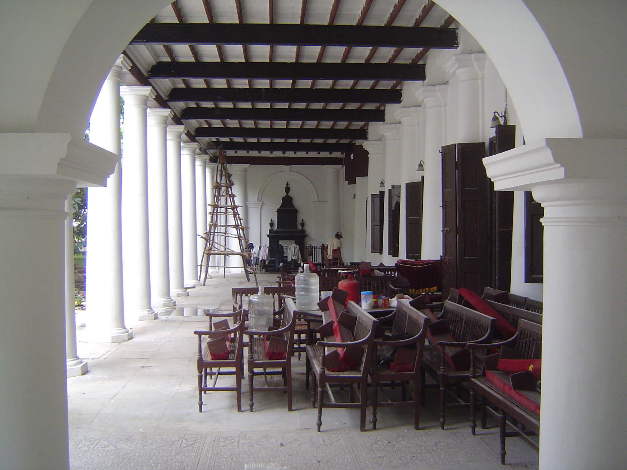 The veranda runs along one side of the prayer hall. The monument in the distance is to a woman benefactor.