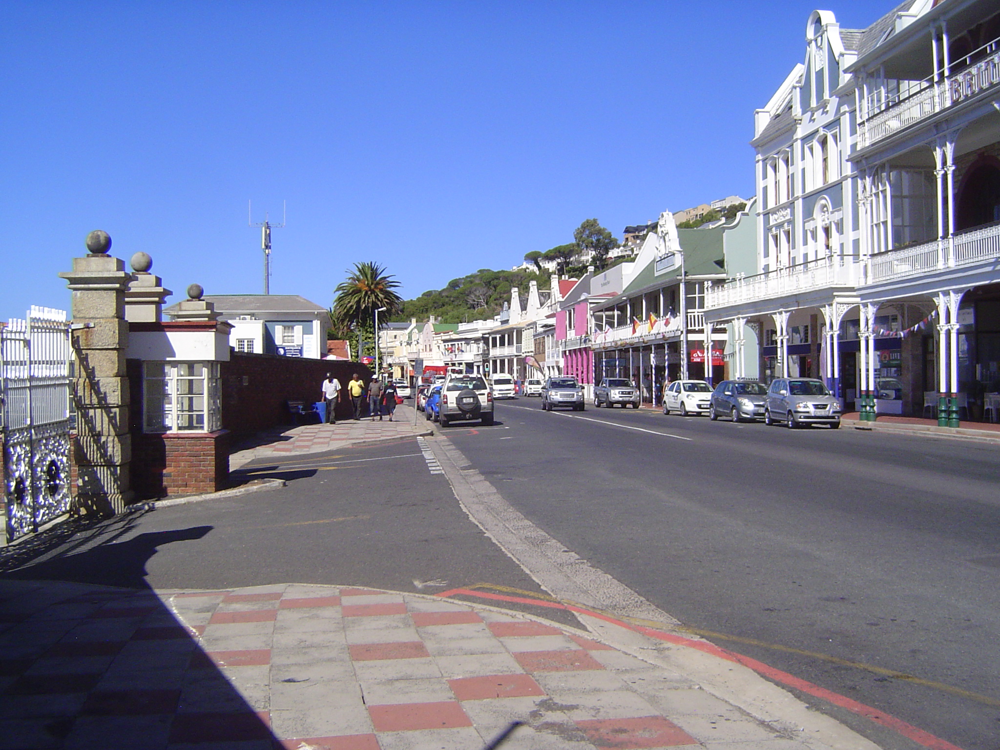 The main street winds along the water's edge, with much of the water's edge occupied by the naval base.