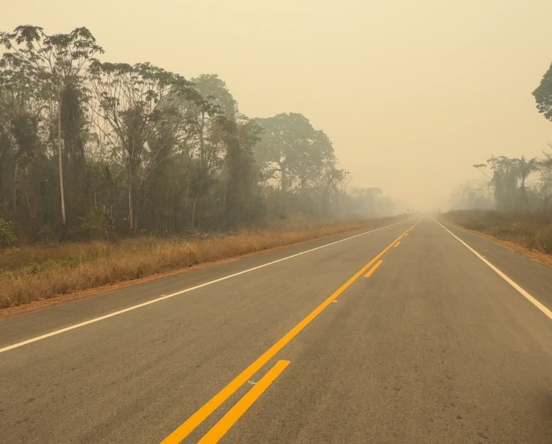 Smoke wafted across the road.