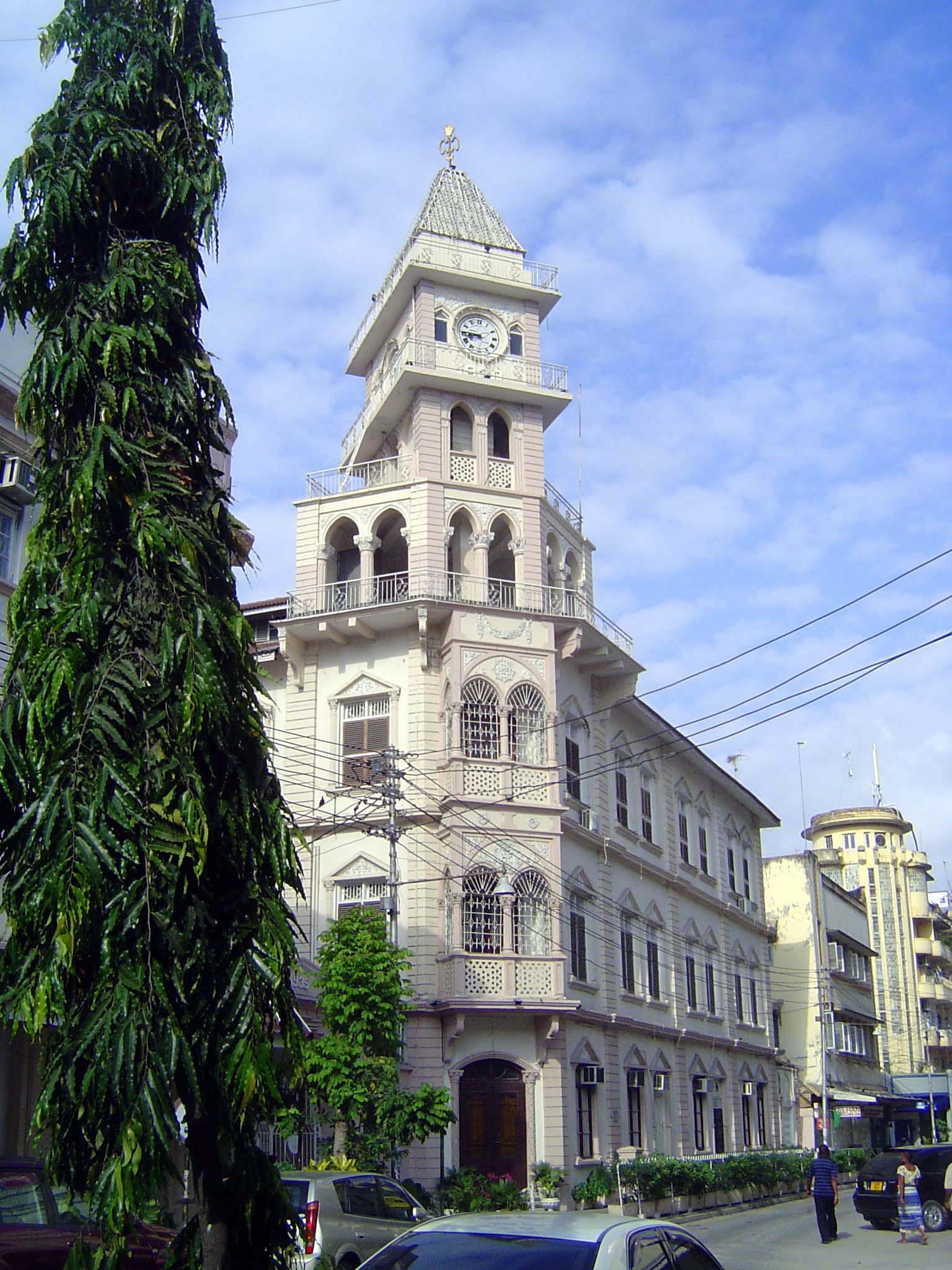It stands next to the effusive Darkhana Jama'at-Khana or prayer hall of the Ismaili Community, built in 1930.