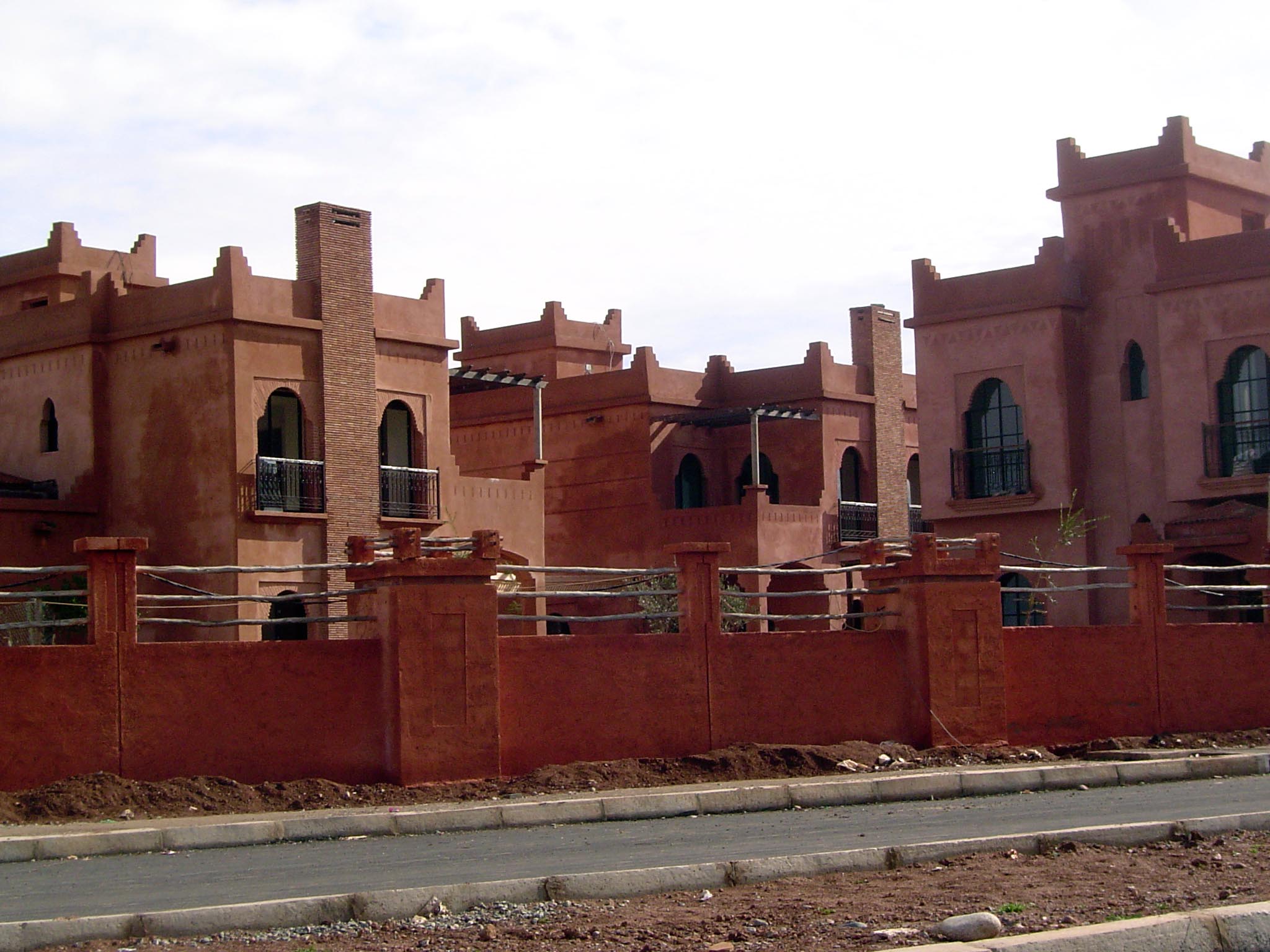 The exteriors are treated with lime and sand; interior floors are marble.