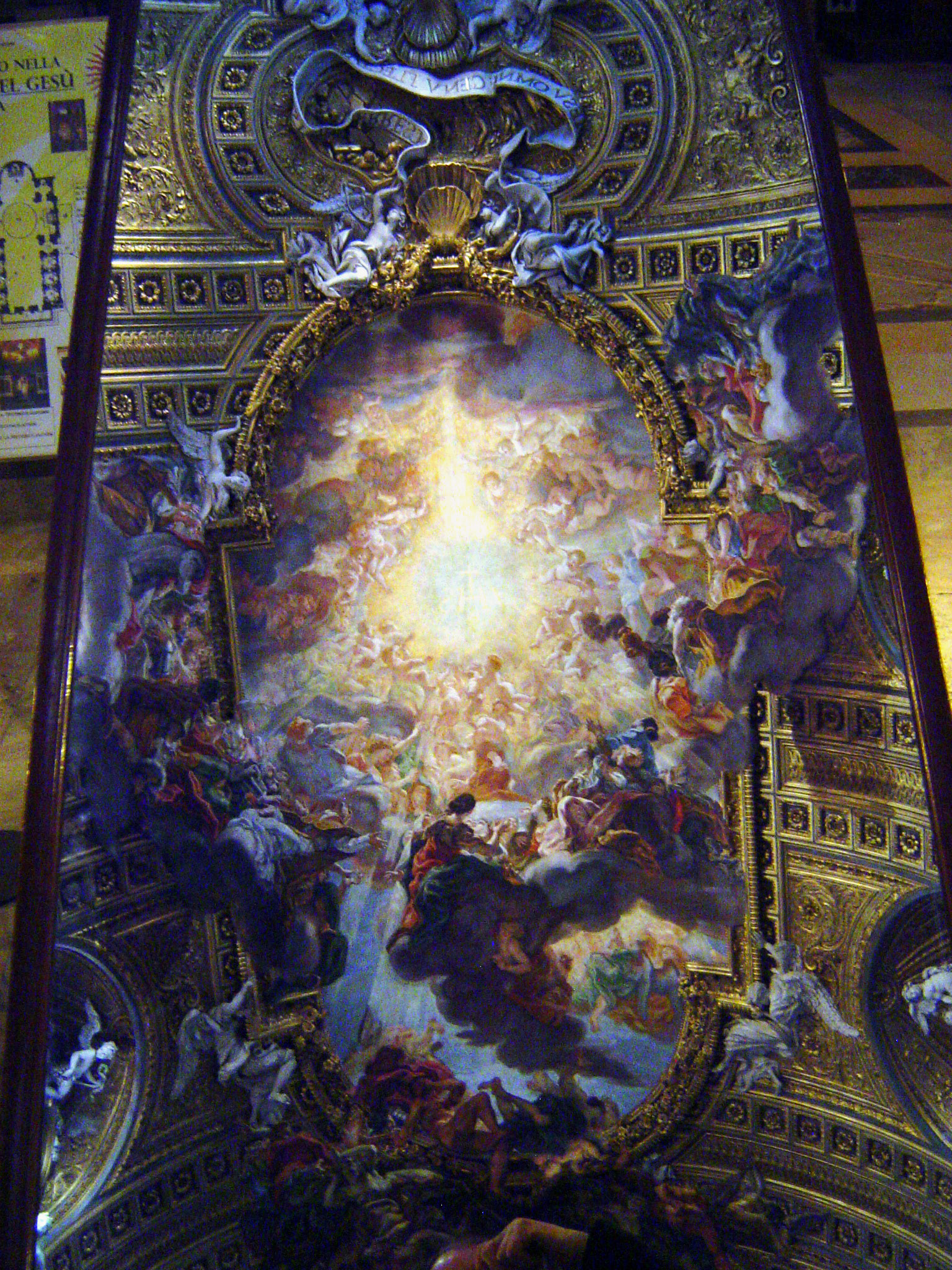 A mirror is positioned on the floor so visitors can see the ceiling without craning.