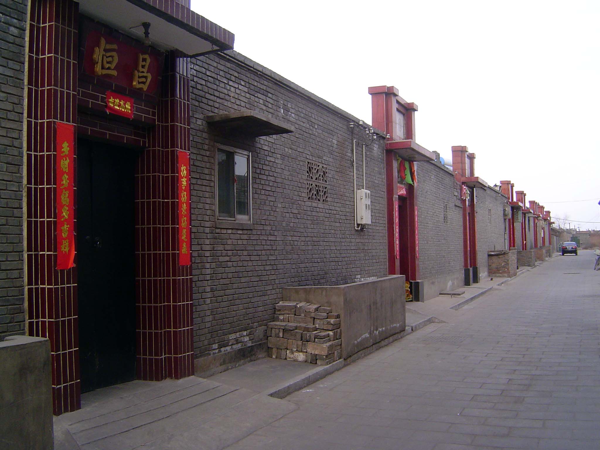 The north half of the walled area has many newer houses.