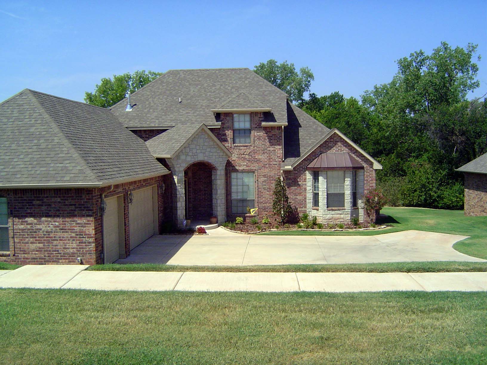 A house fronting on raw land.
