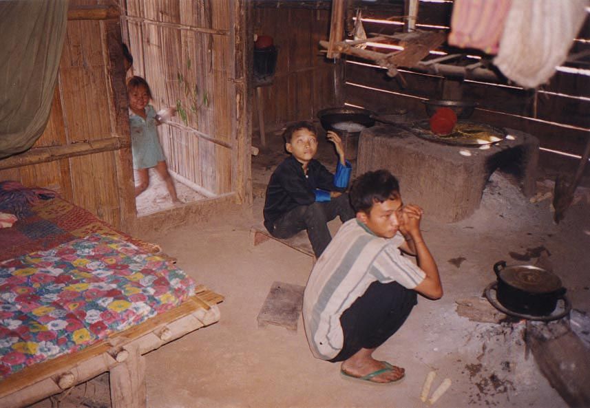 Inside, children watched a shaman attempt a cure.