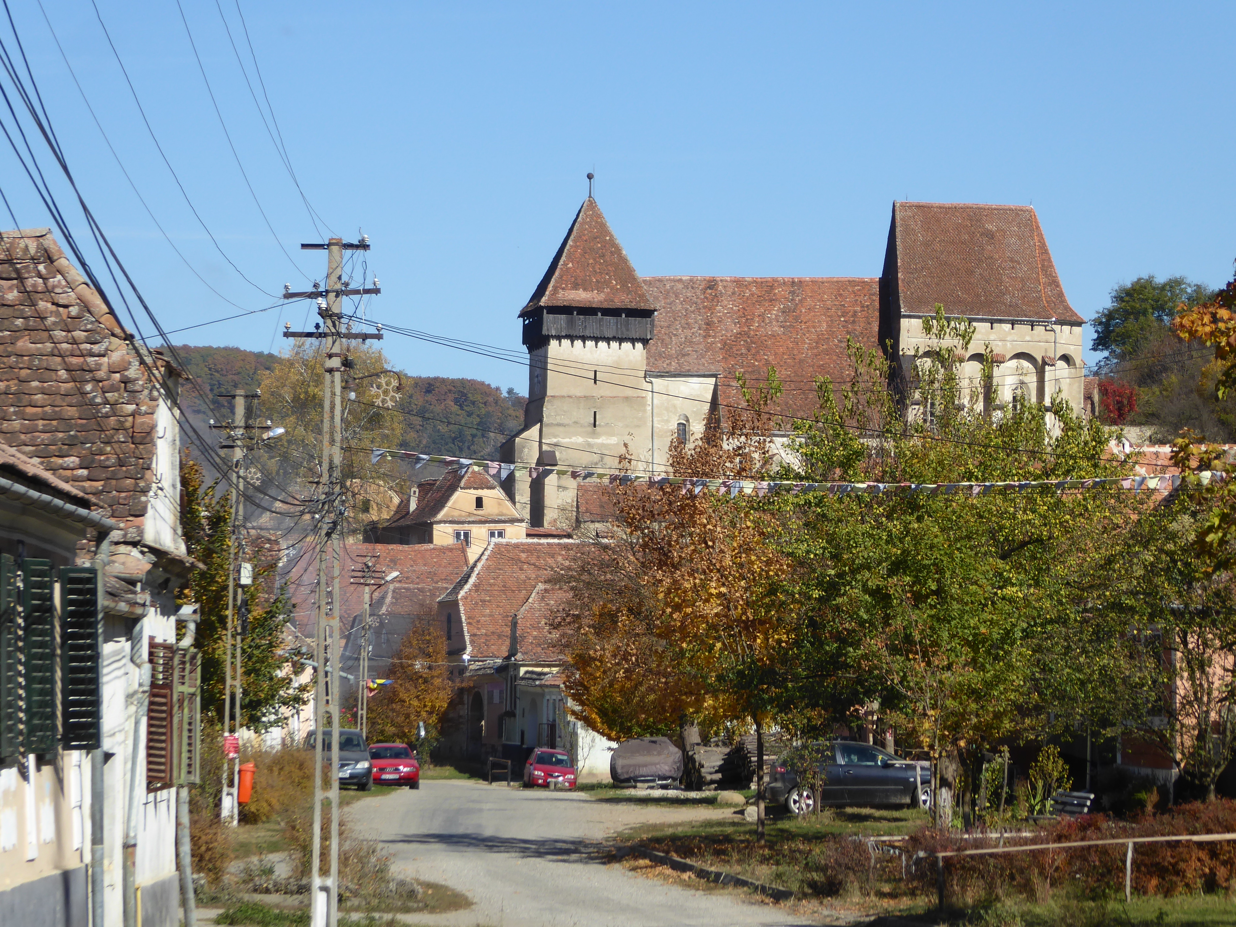 Tucked into this narrow valley with a few hundred people is this seemingly oversized fortress-church.