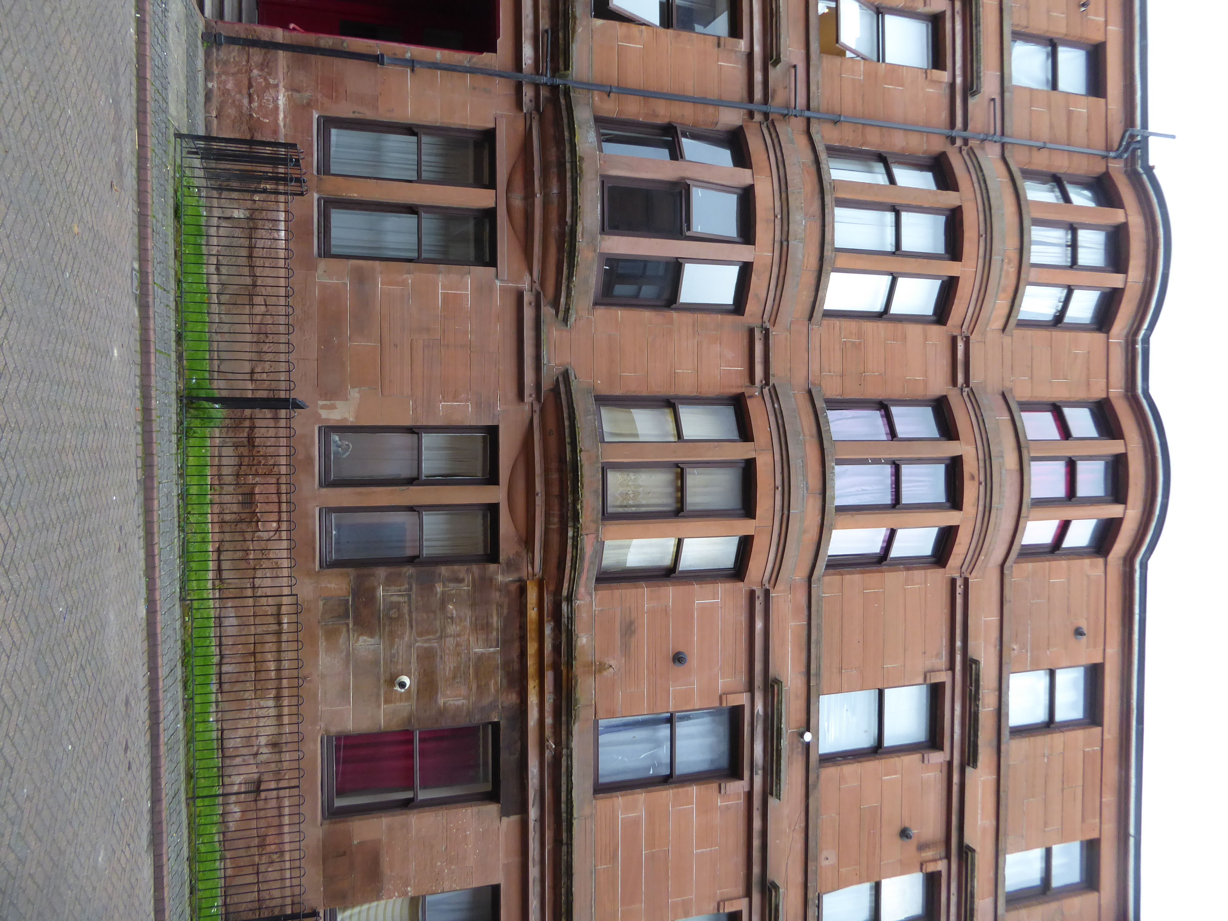 The shipyard provided housing, too, in the city's familiar red sandstone. Luath Street