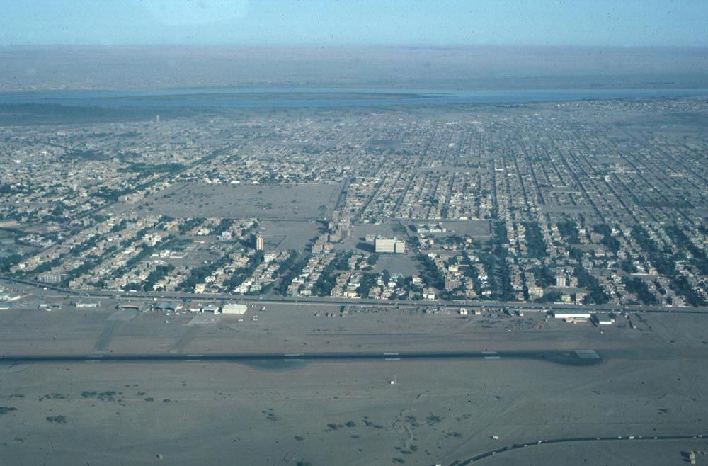 Looking west from above the airport. The White Nile is in the distance. The gridded subdivision is "New Extension," planned in the 1950s by