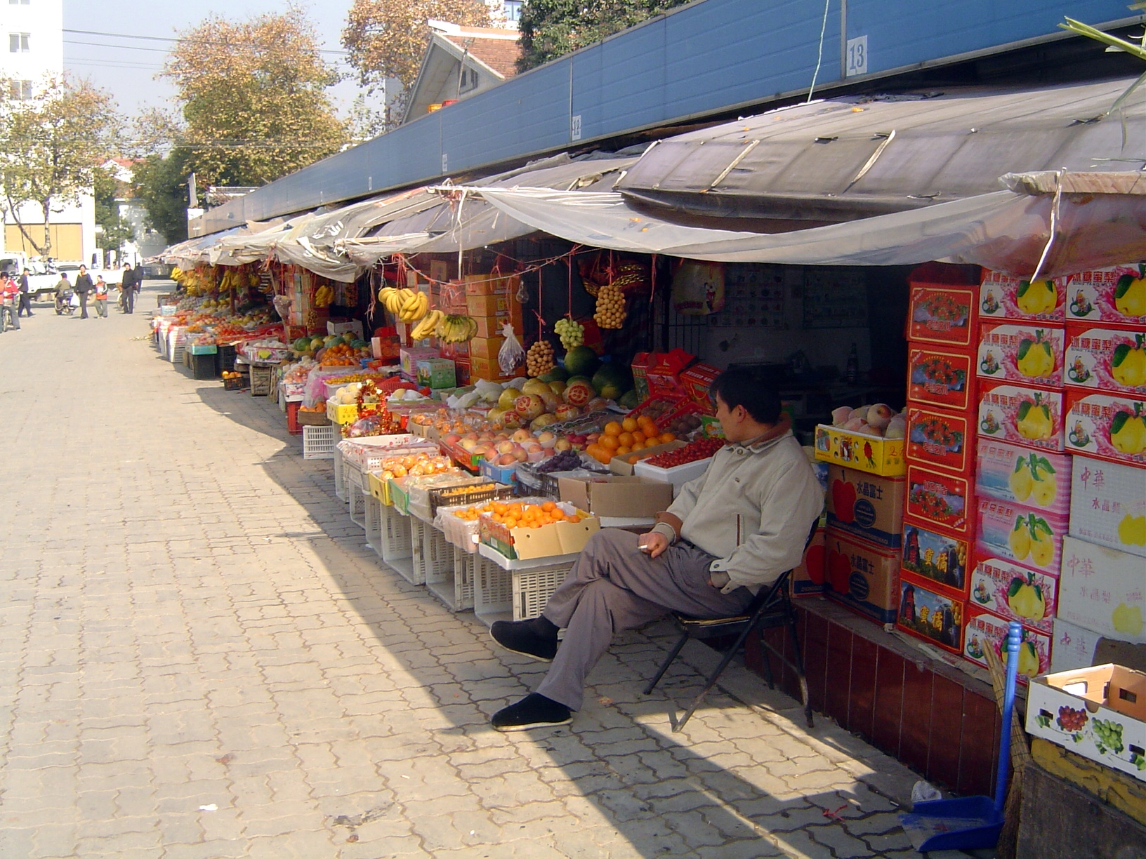 A fruit market, noteworthy not only for its color but its quality.