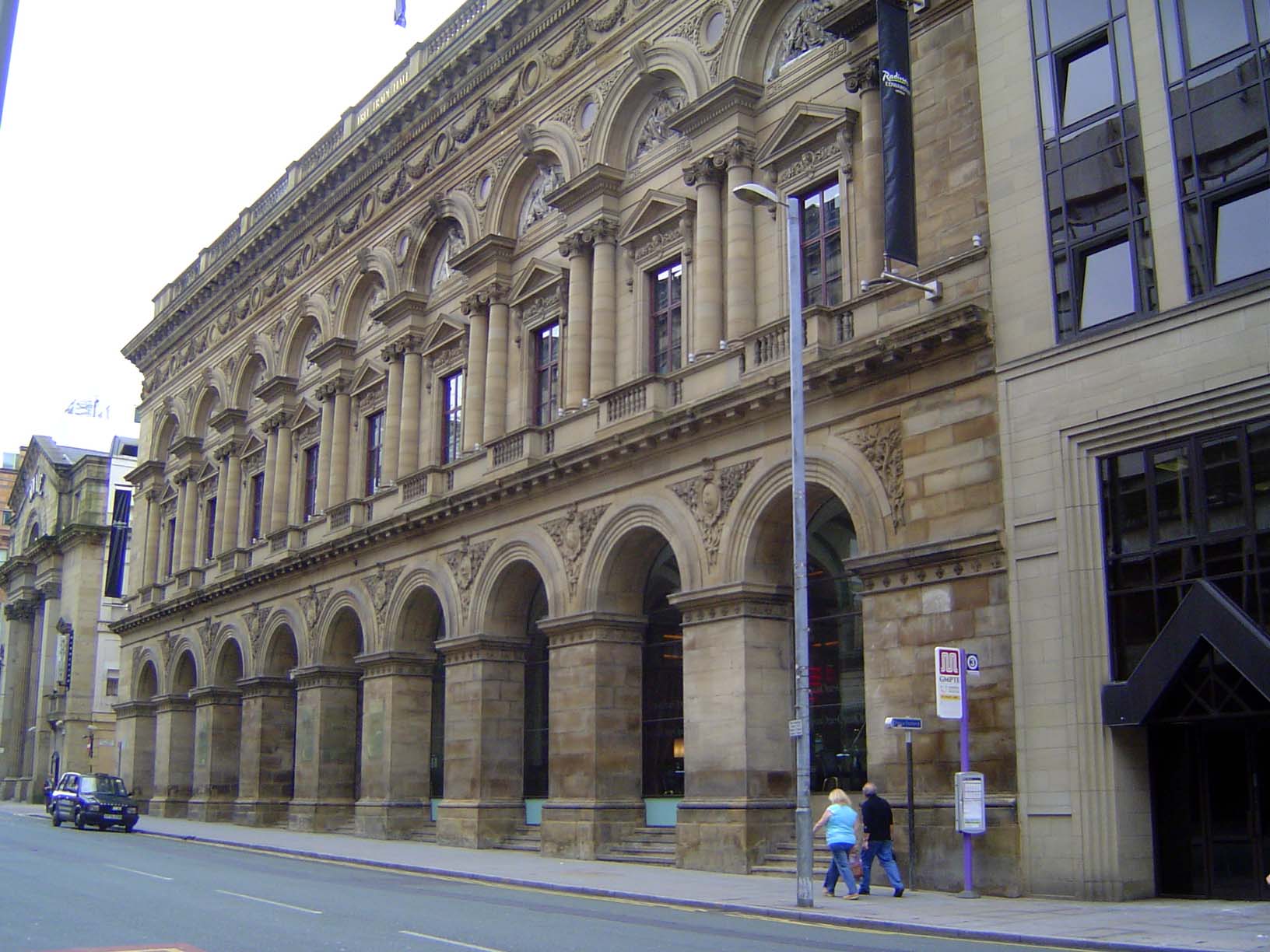 The city's industrial wealth supported the development of a massive downtown. Here, the Free Trade Hall of 1853-56. Pevsner admired it great