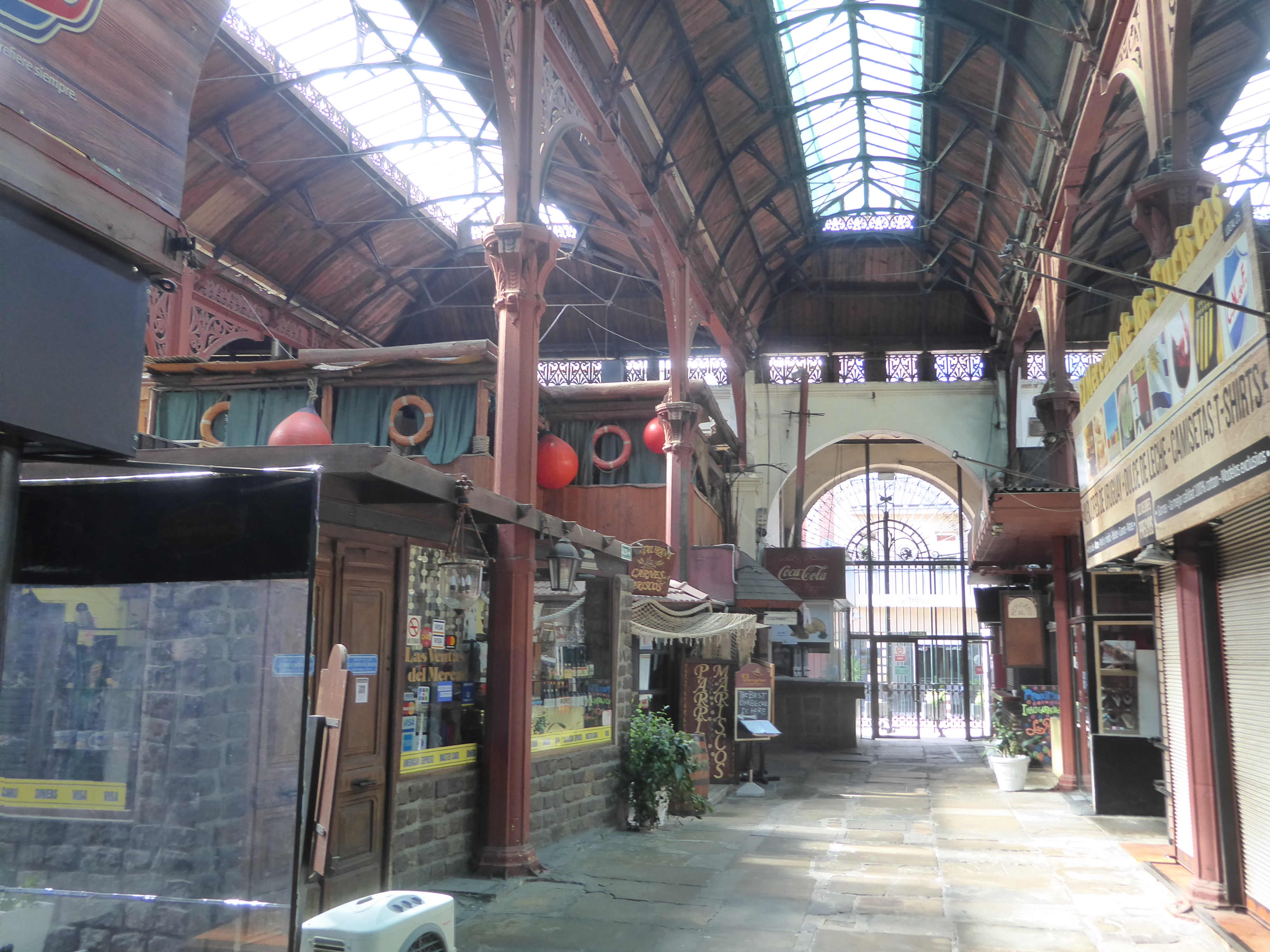 No flies buzzing, no handcarts bumping, but the ironwork's nice. The life preservers and floats give the tourist game away.