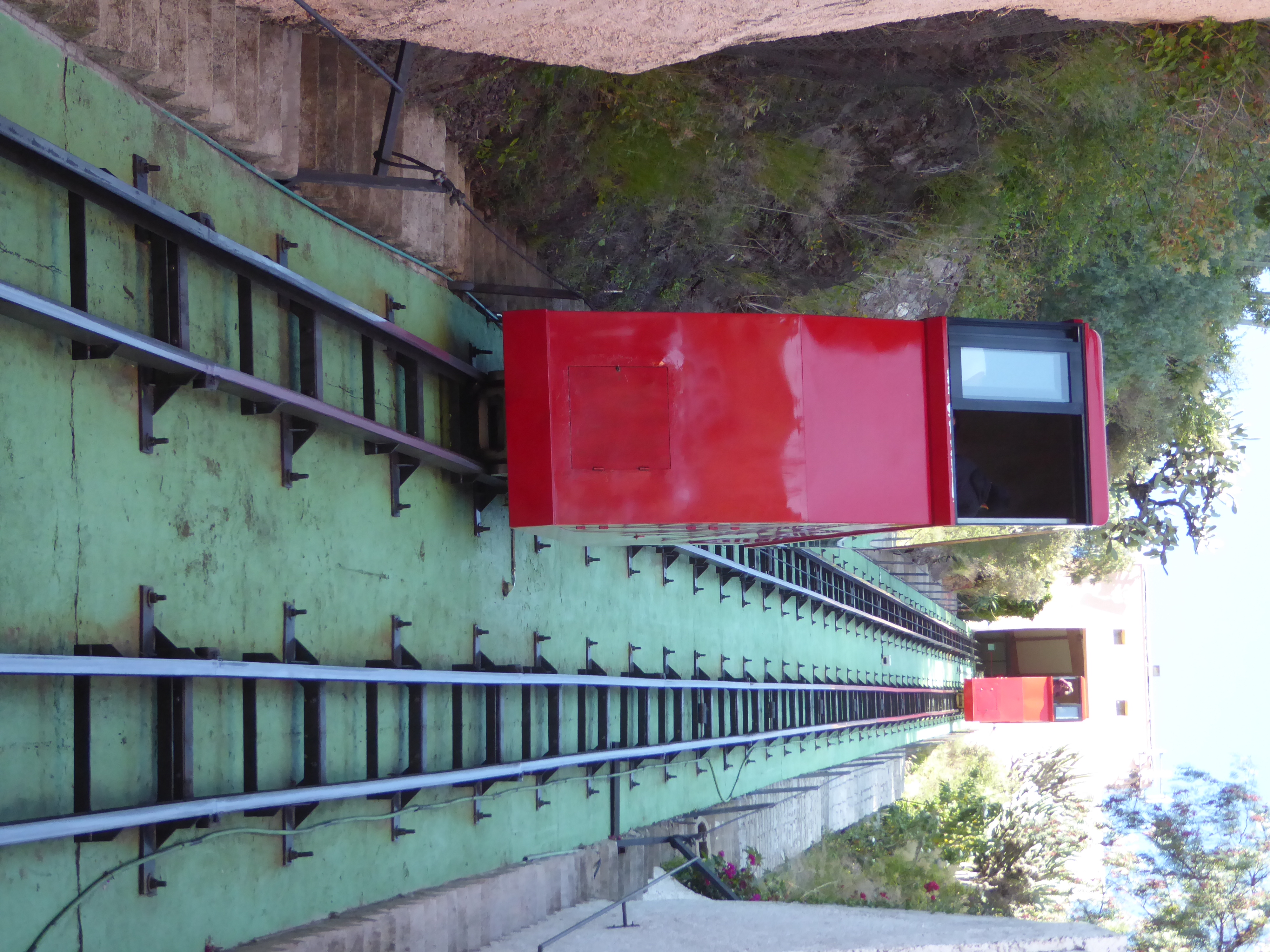 The pictures shown earlier from the ridge overlooking the city were taken after a short ride up this funicular, which may look old but isn't