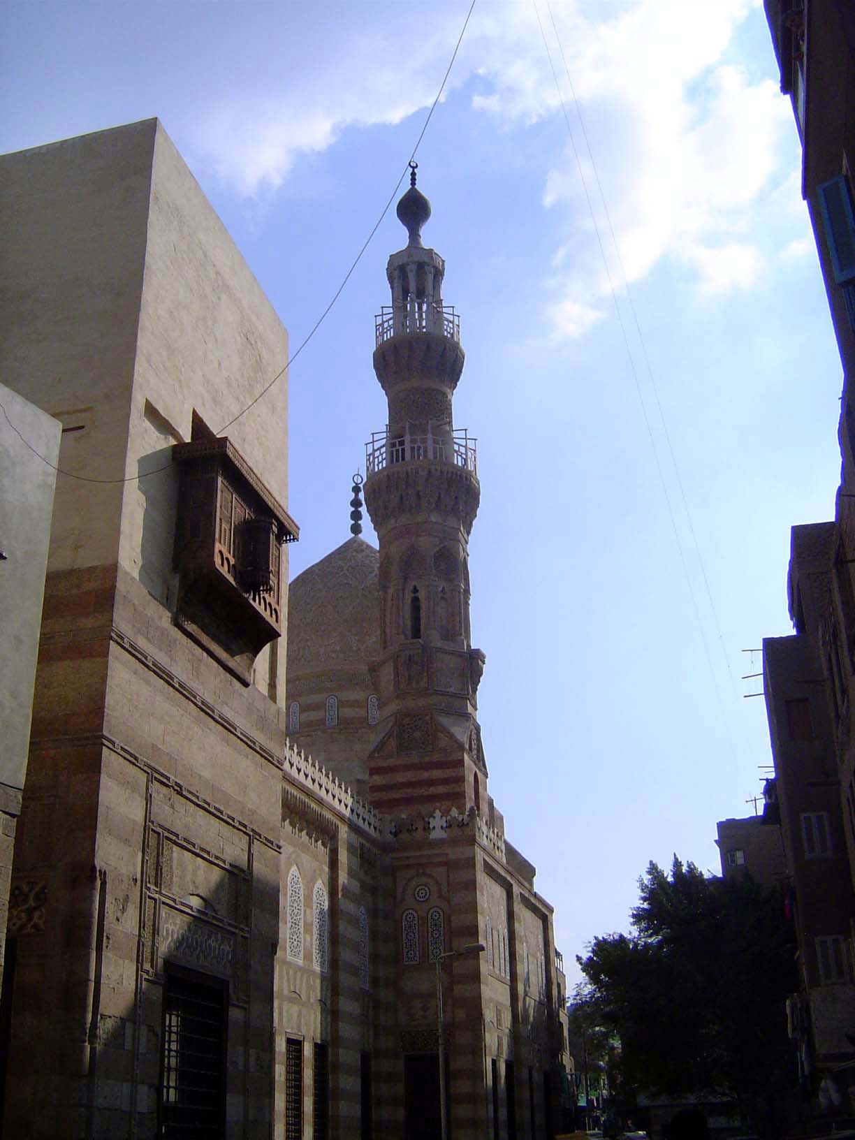 No. 218 The Mosque of Sarghatmish, built in 1356 by an amir of al-Nasir Muhammed. This is the mosque previously seen rising about the ziyada