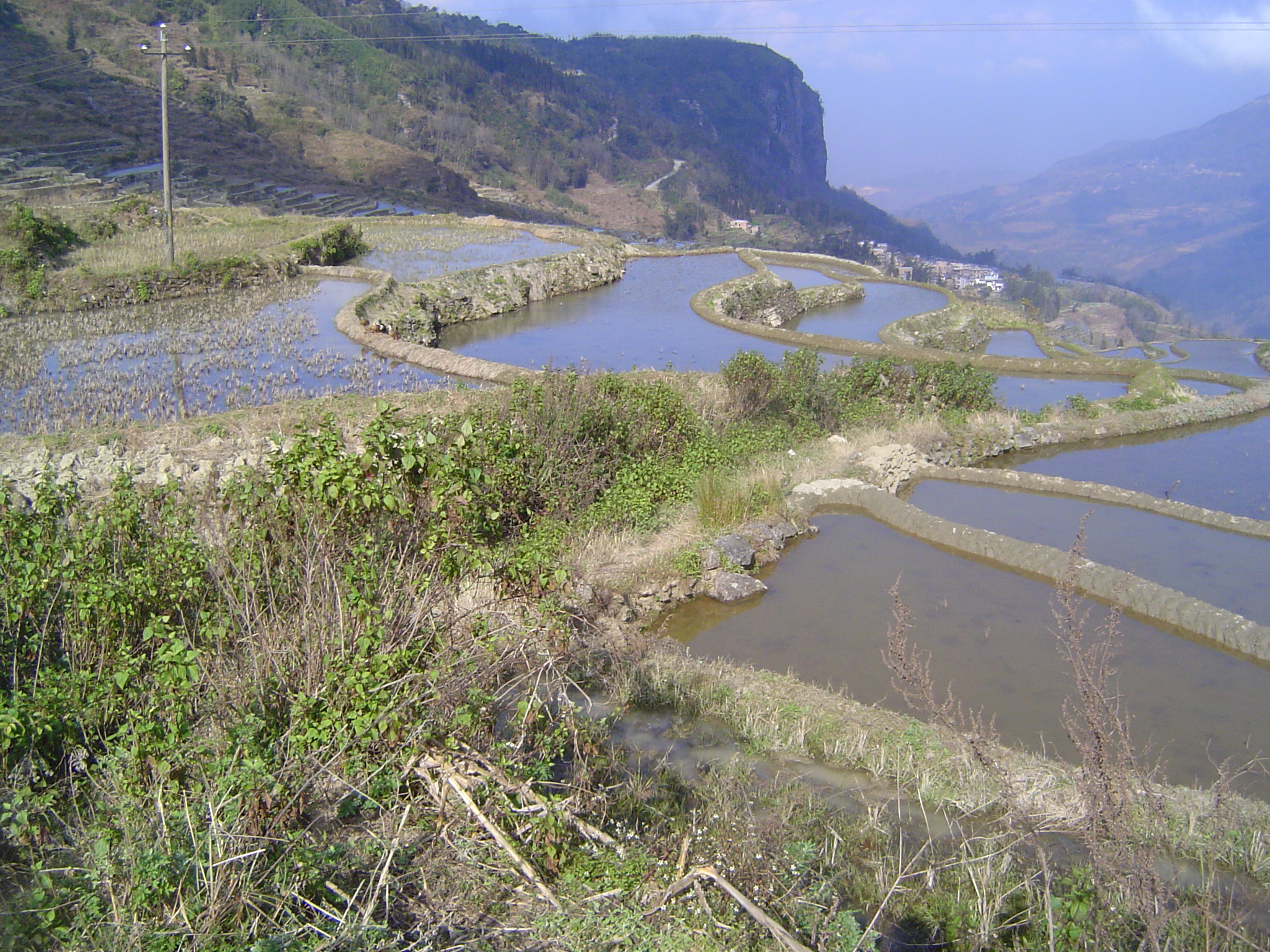 You can see its course. In the distance there's another village. The World Heritage site includes 82. According to UNESCO, the site also inc