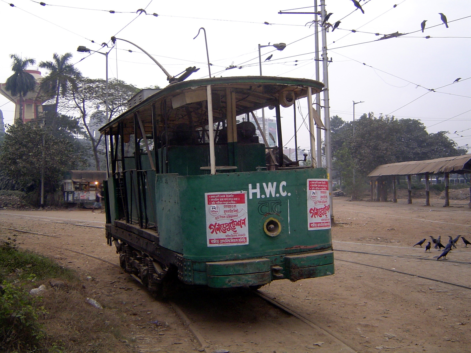 A maintenance car on the city's antiquated tramline. Under the white letters for Howrah Works Car you can make out the old logo for Calcutta