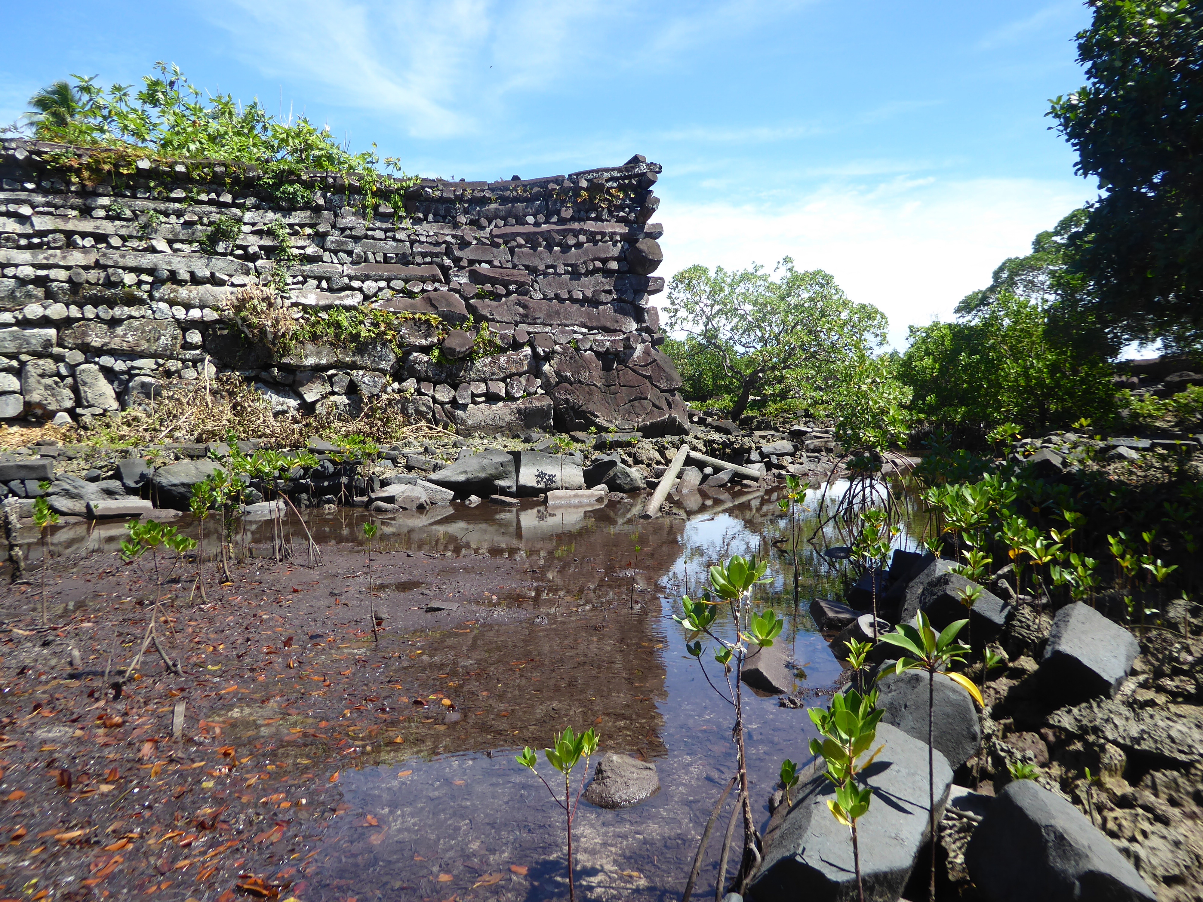 Here's the view back as we wade across to Kerien, an islet to the southeast that supports another tomb enclosure. The tide's out today, reve