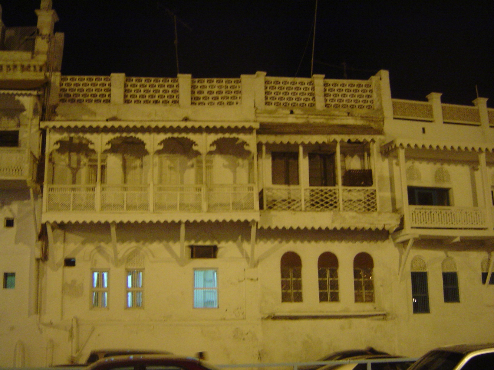 Still at night, a remarkable stretch of the Muttrah waterfront called Sur Lawatiya, founded about 1700 perhaps by Portuguese or Hyderabadi t