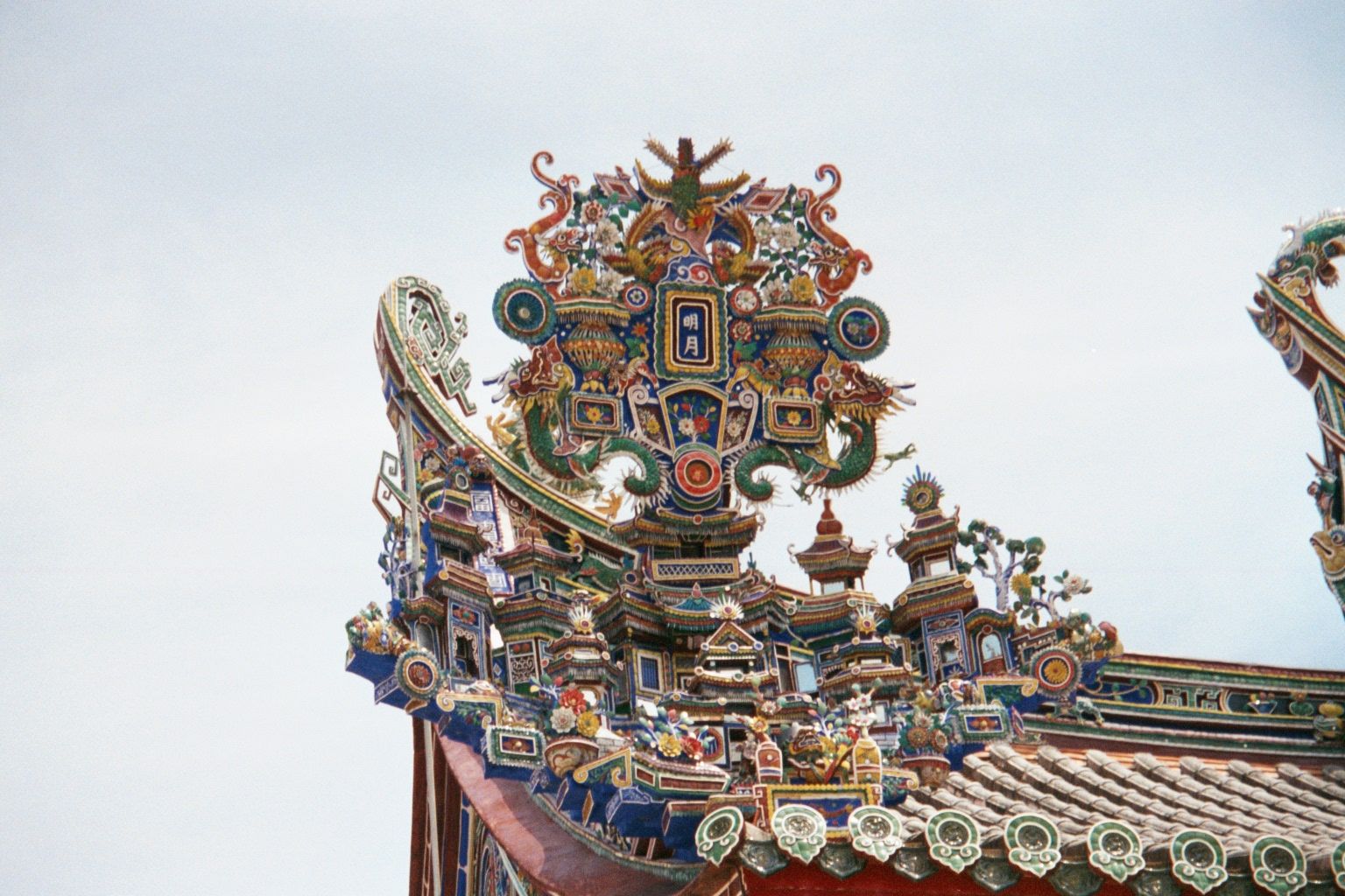 Roof trim: hints of ships are common in the ornamentation, built by people who sailed across the sea to get here.