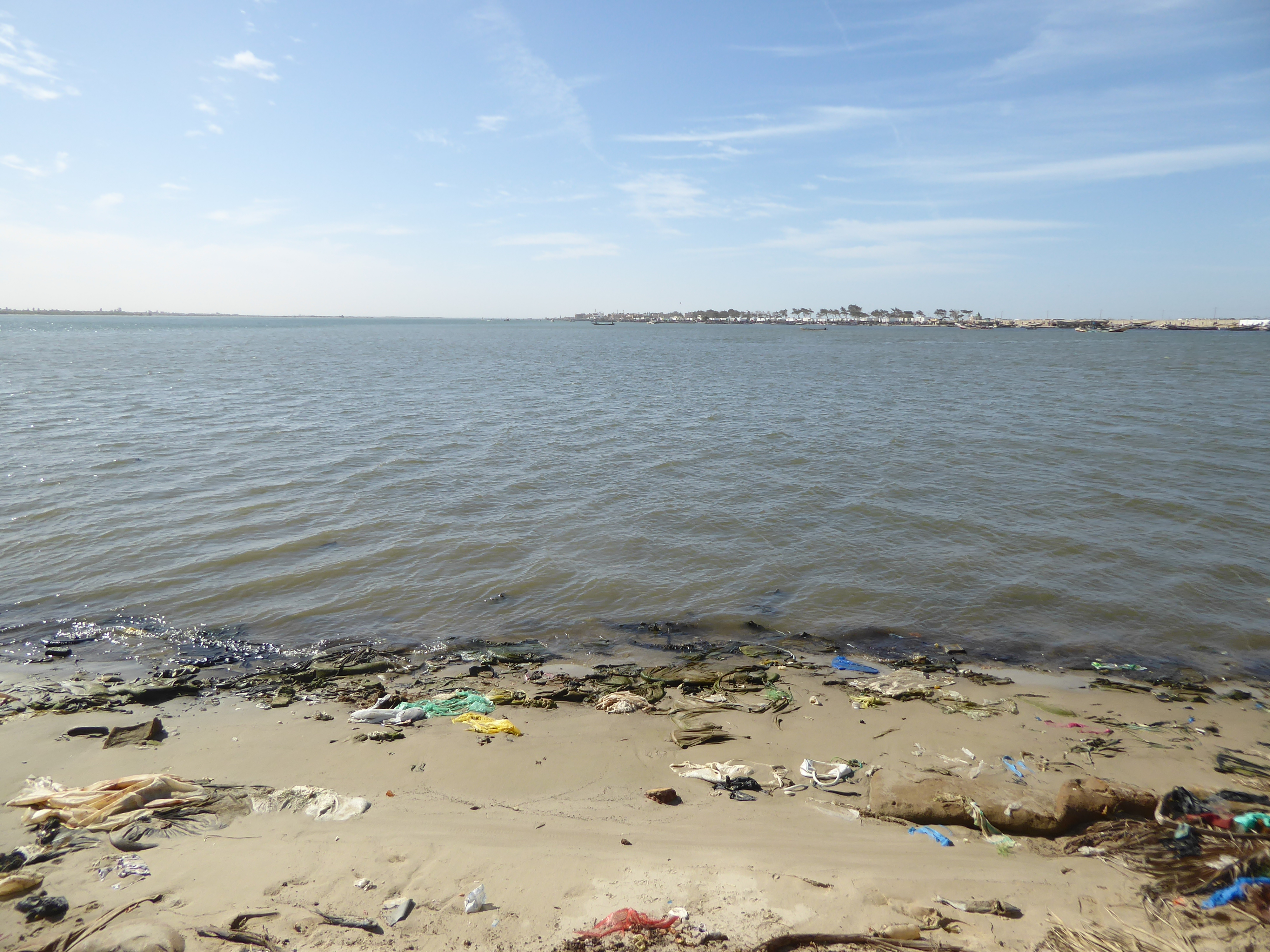 We're at the south tip of the island and four miles from the open sea. That's the mainland on the left; on the right is Barbarie, the fishin