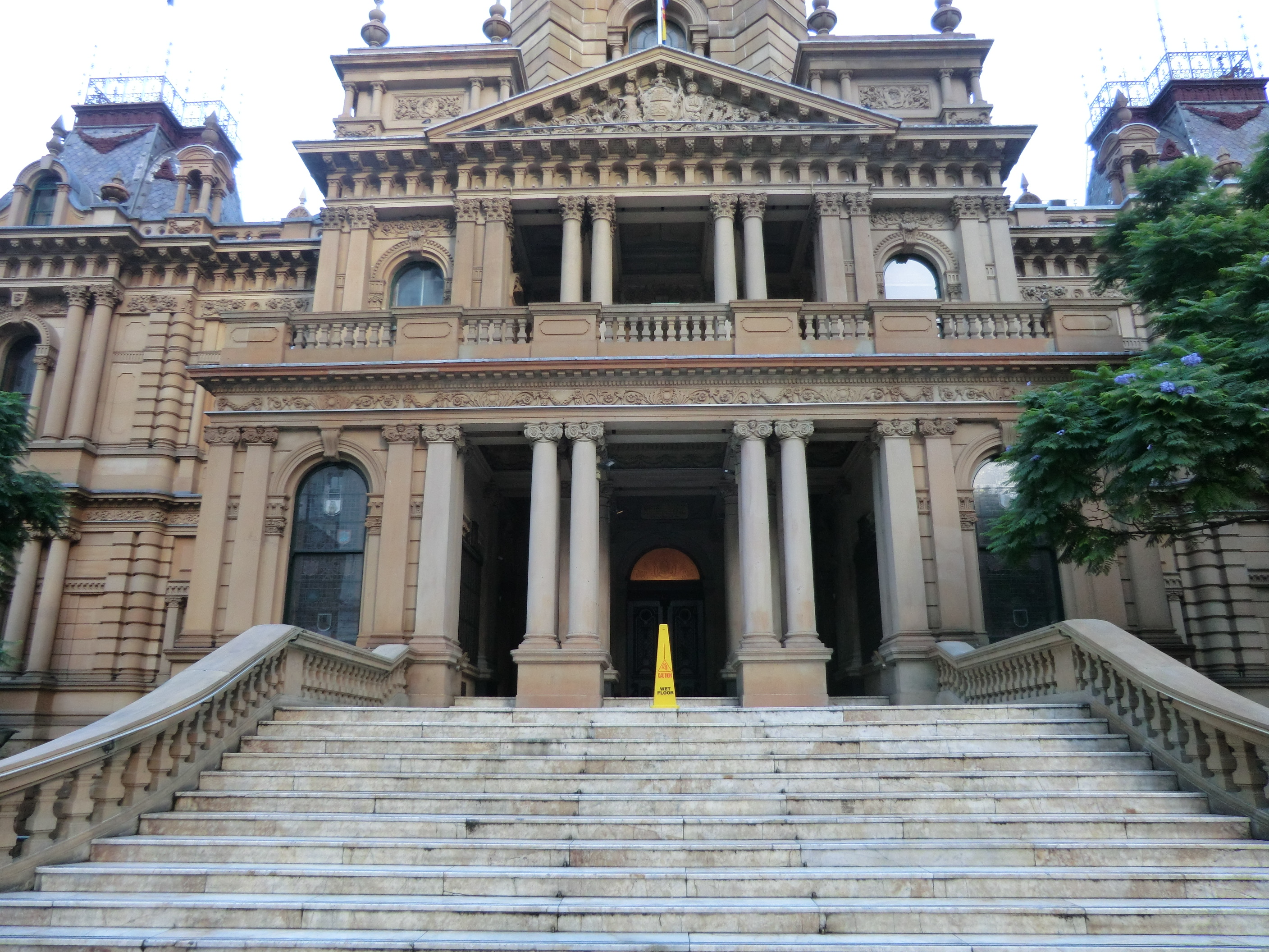 The stairs seem a bit brighter than the building. They're newer, because they had to be replaced when the original entrance was weakened in