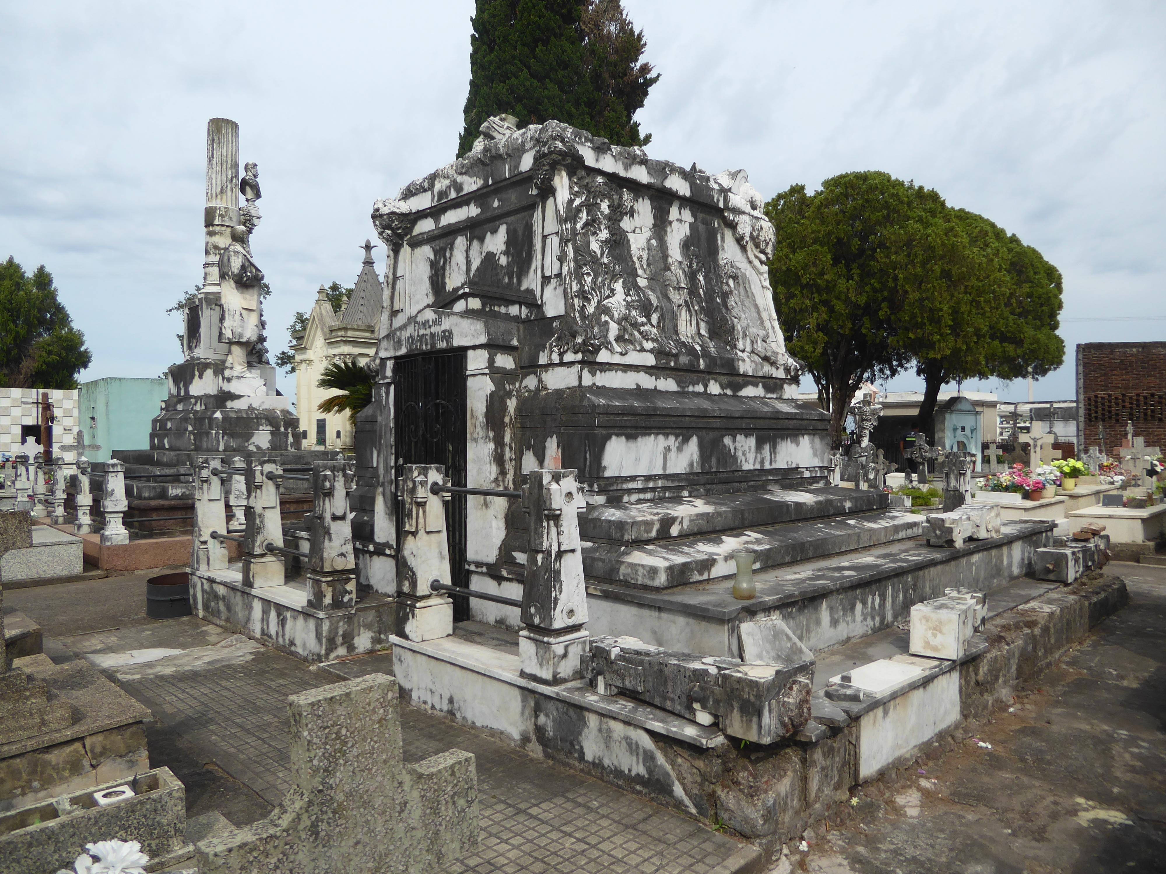 See the bust near the column on the left.