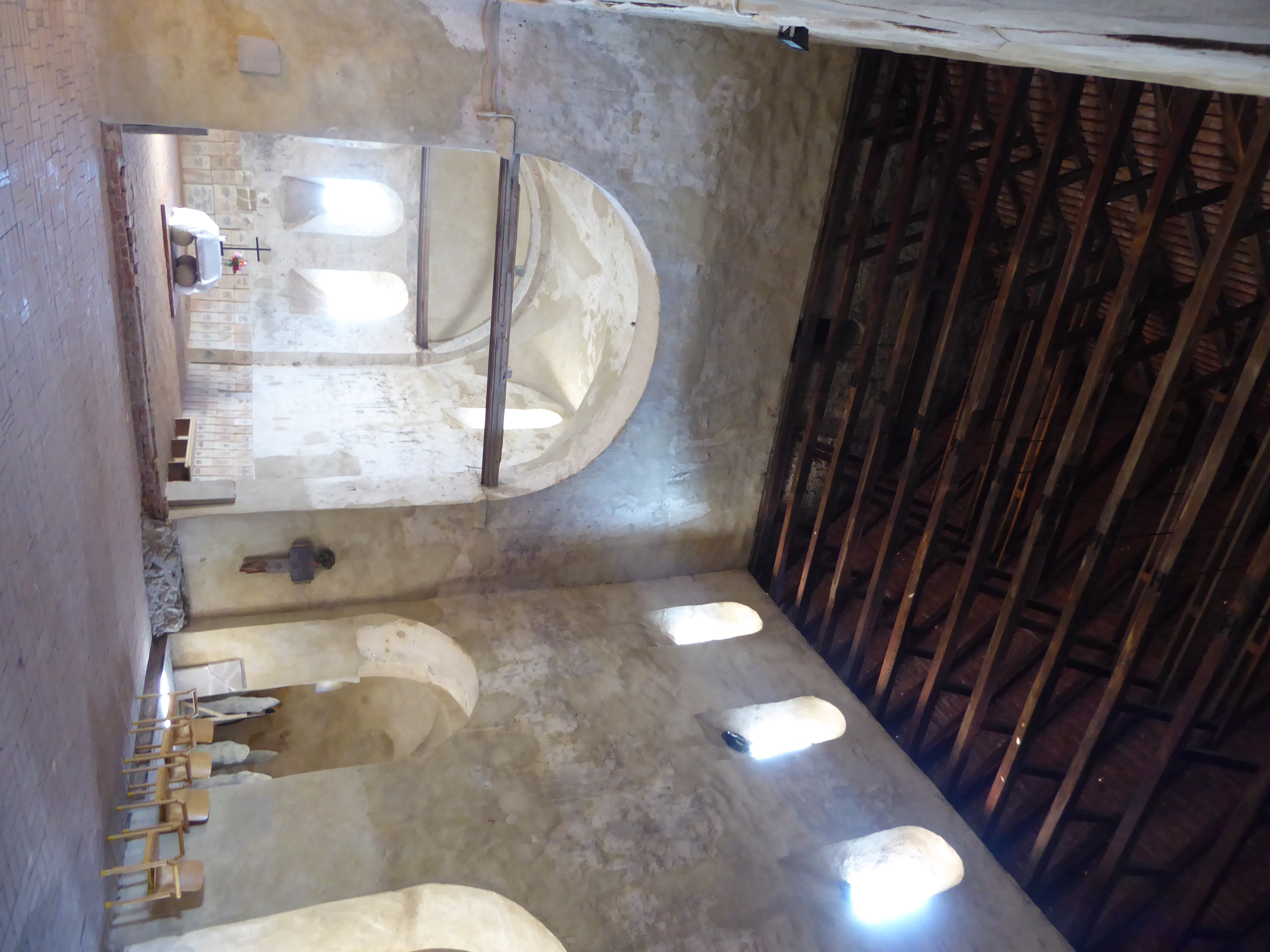 The church, rarely used for services, has hardly been modified since it was built. One exception: the square tiles around the apse identify