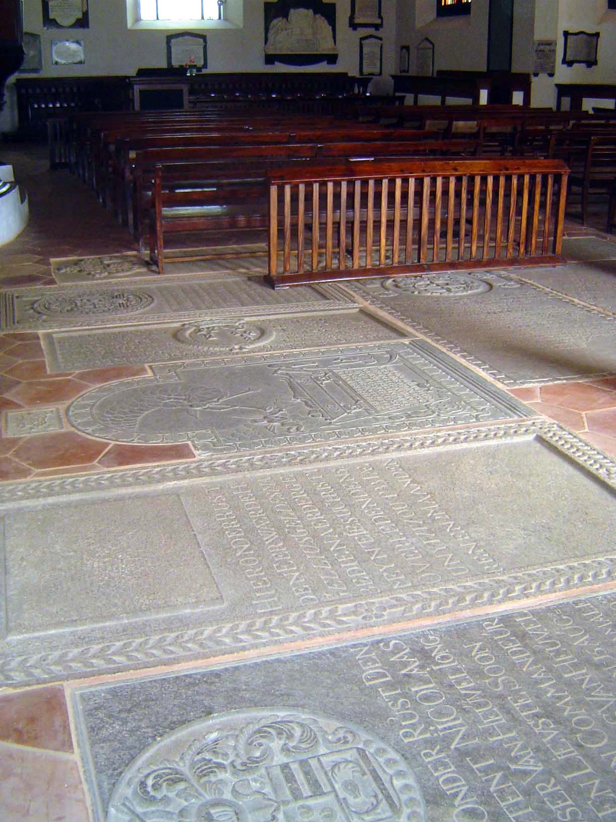 But then you see the floor, into which tombstones have been moved from the nearby cemetery. They're amazingly sharp, unweathered.