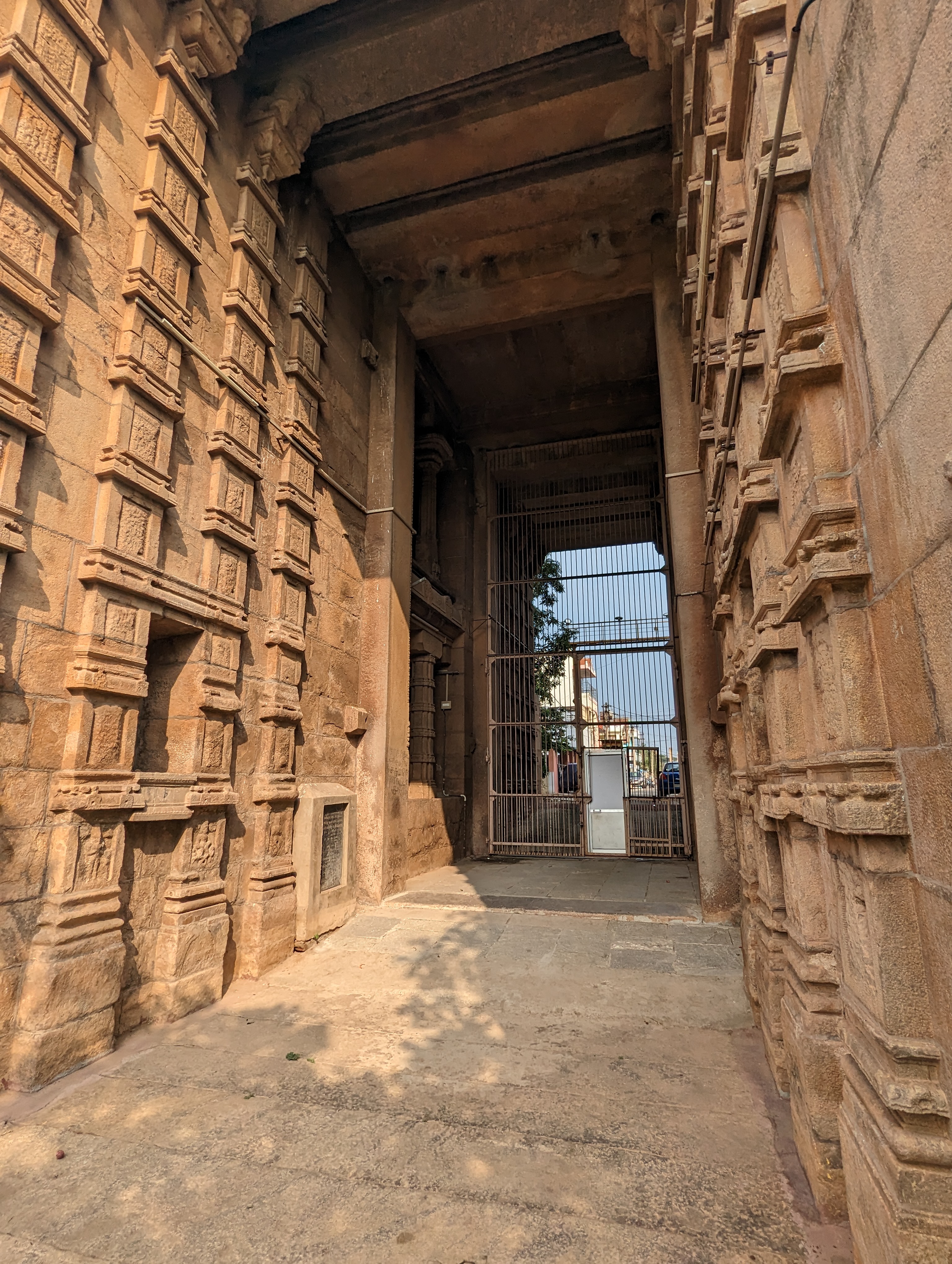 Notice the flat surface of the most distant column.  It's one of four jambs placed as anchors when construction of a gopuram begins.  We'll