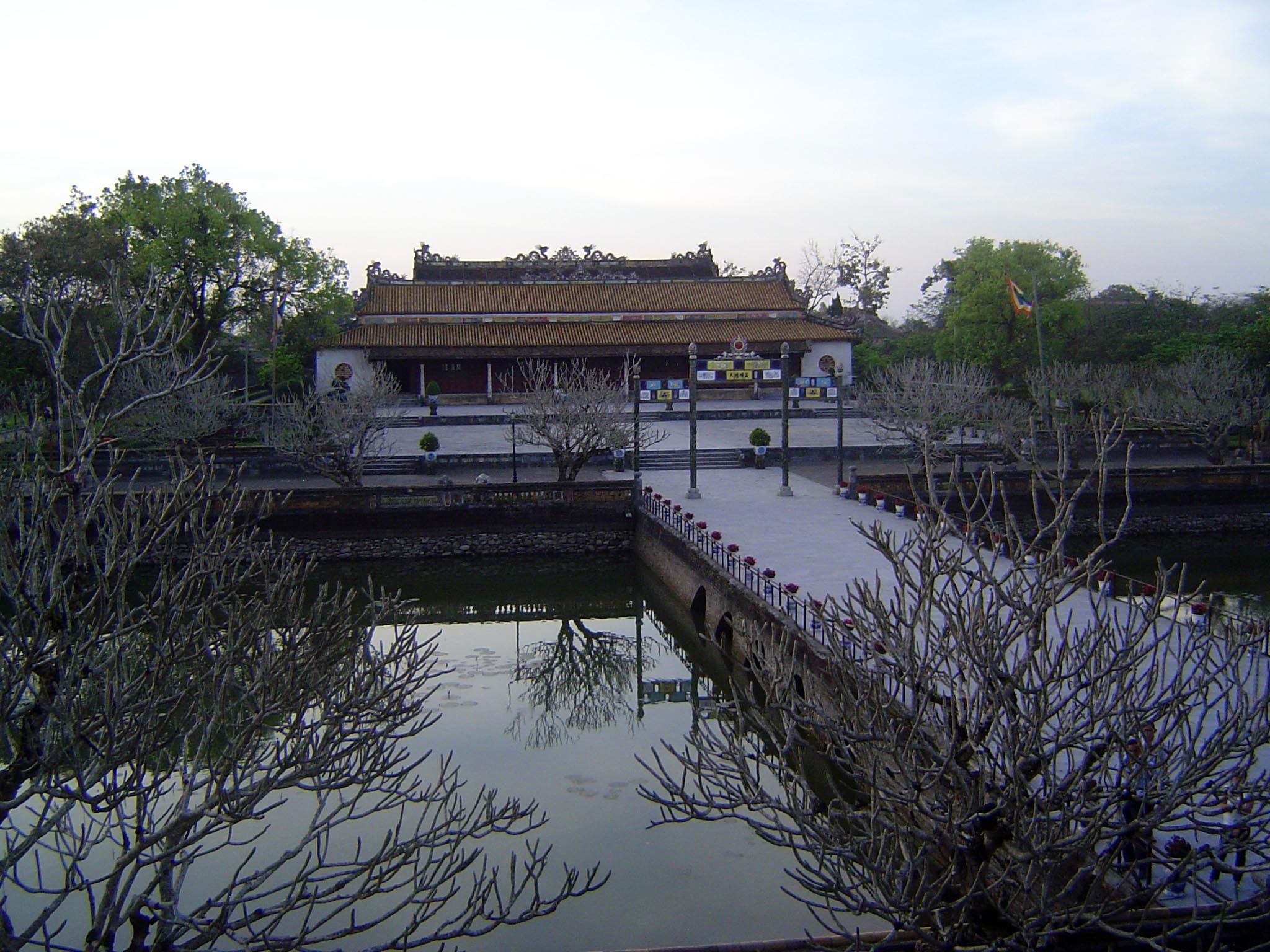 A view from the gate-top pavilion over Thai Dich Lake, the Trung Dao Bridge, and the Hall of Supreme Harmony. Call it a budget version of Be