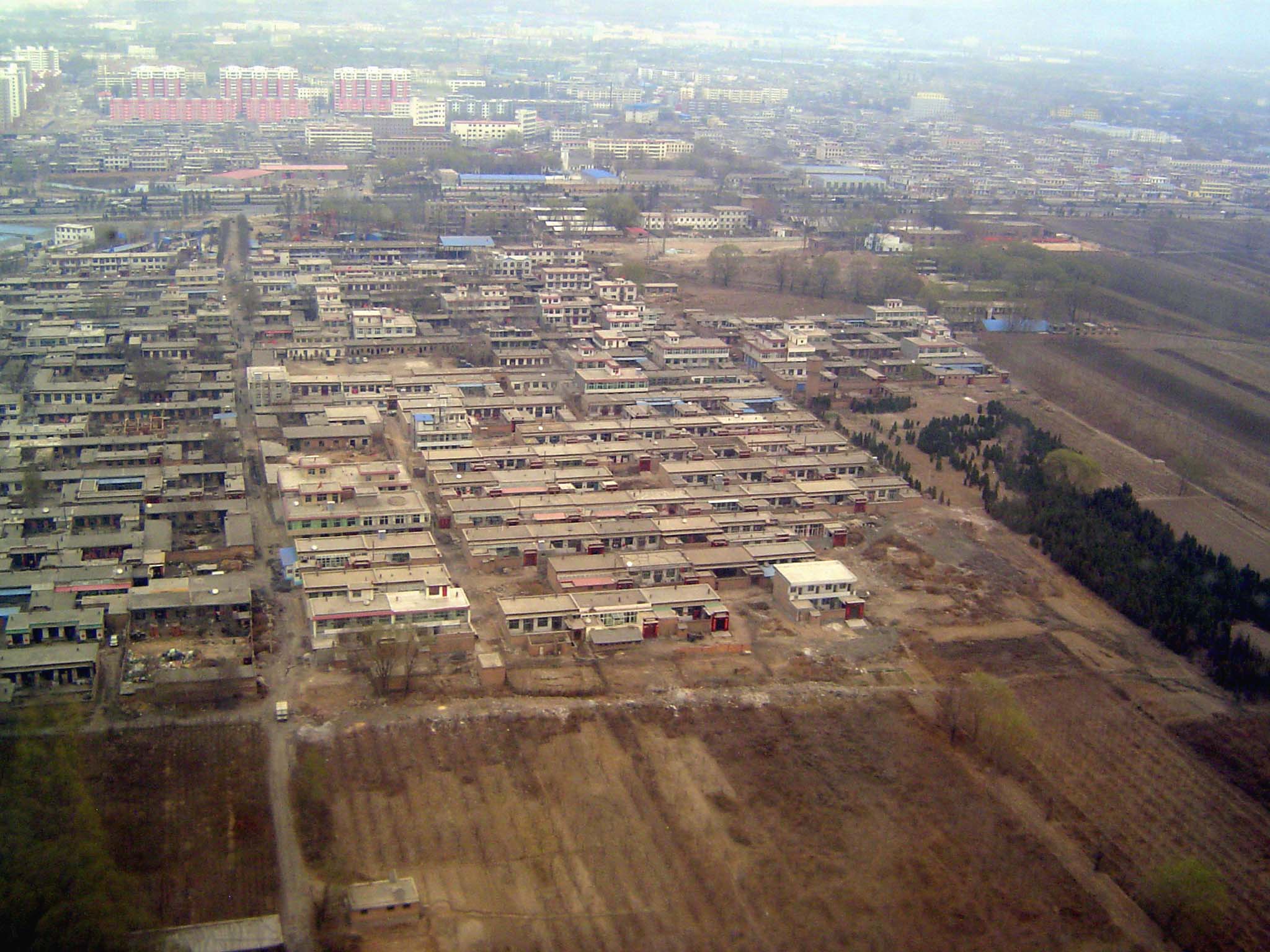 The older areas are a reminder of the poverty from which China is emerging.