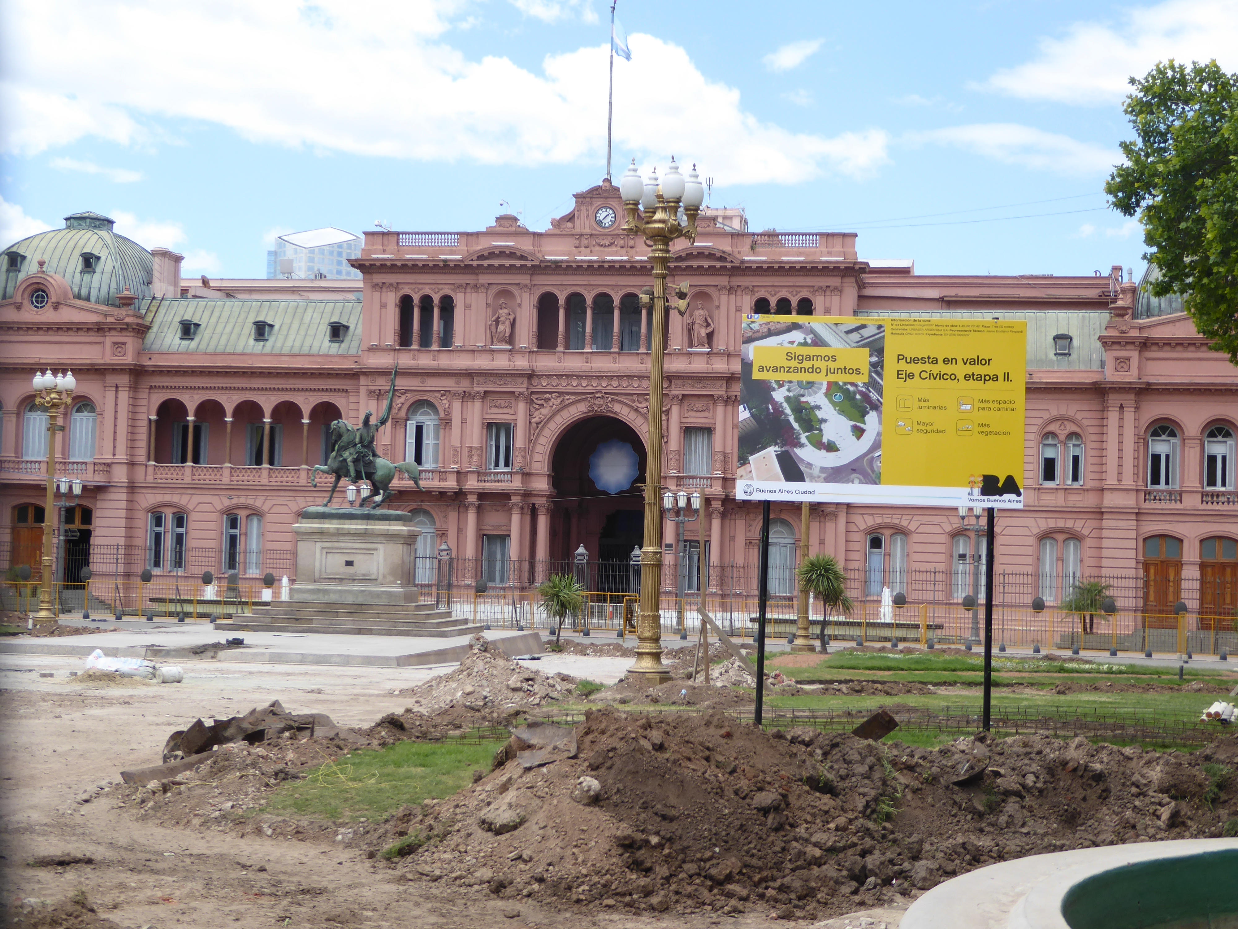 We've jumped up over the barrier for a view of the Casa Rosada. The statue is of General Belgrano, one of the many heroes of the war for ind
