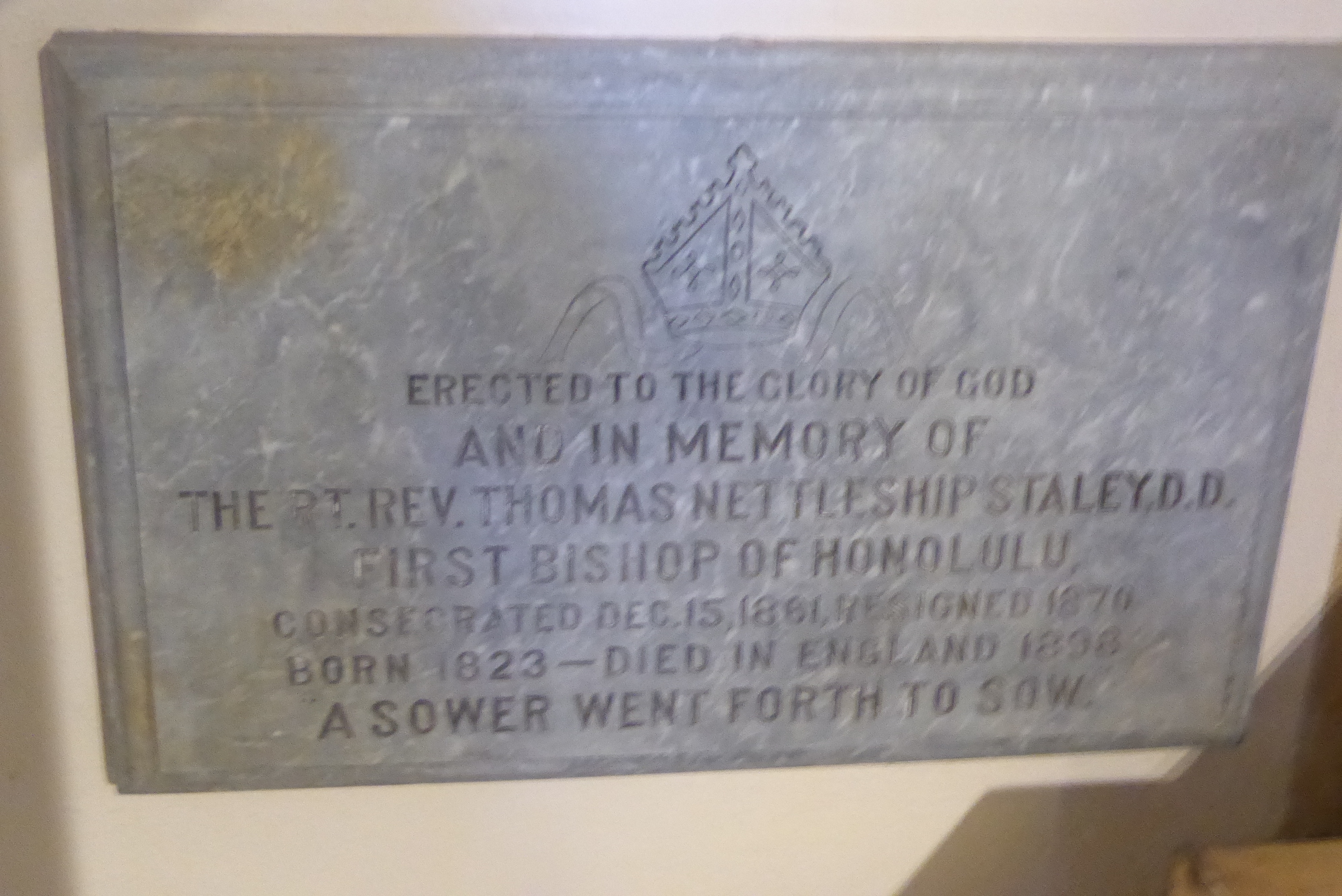 This plaque is on the chancel ambulatory. Bishop Staley was a Cambridge graduate from 1844. Following his appointment as principal of the Co