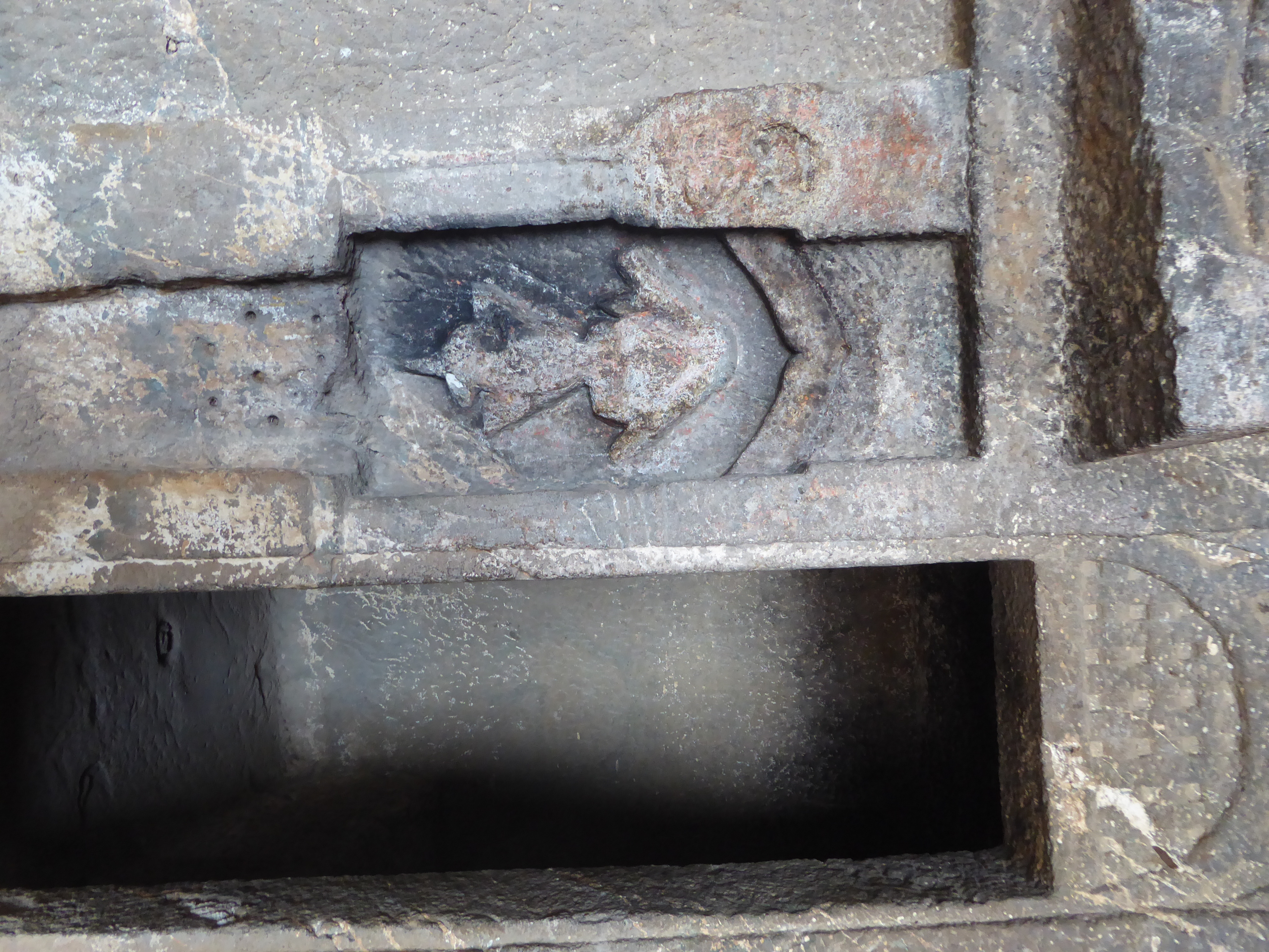 At some later date, a deity has been carved in the back wall.
