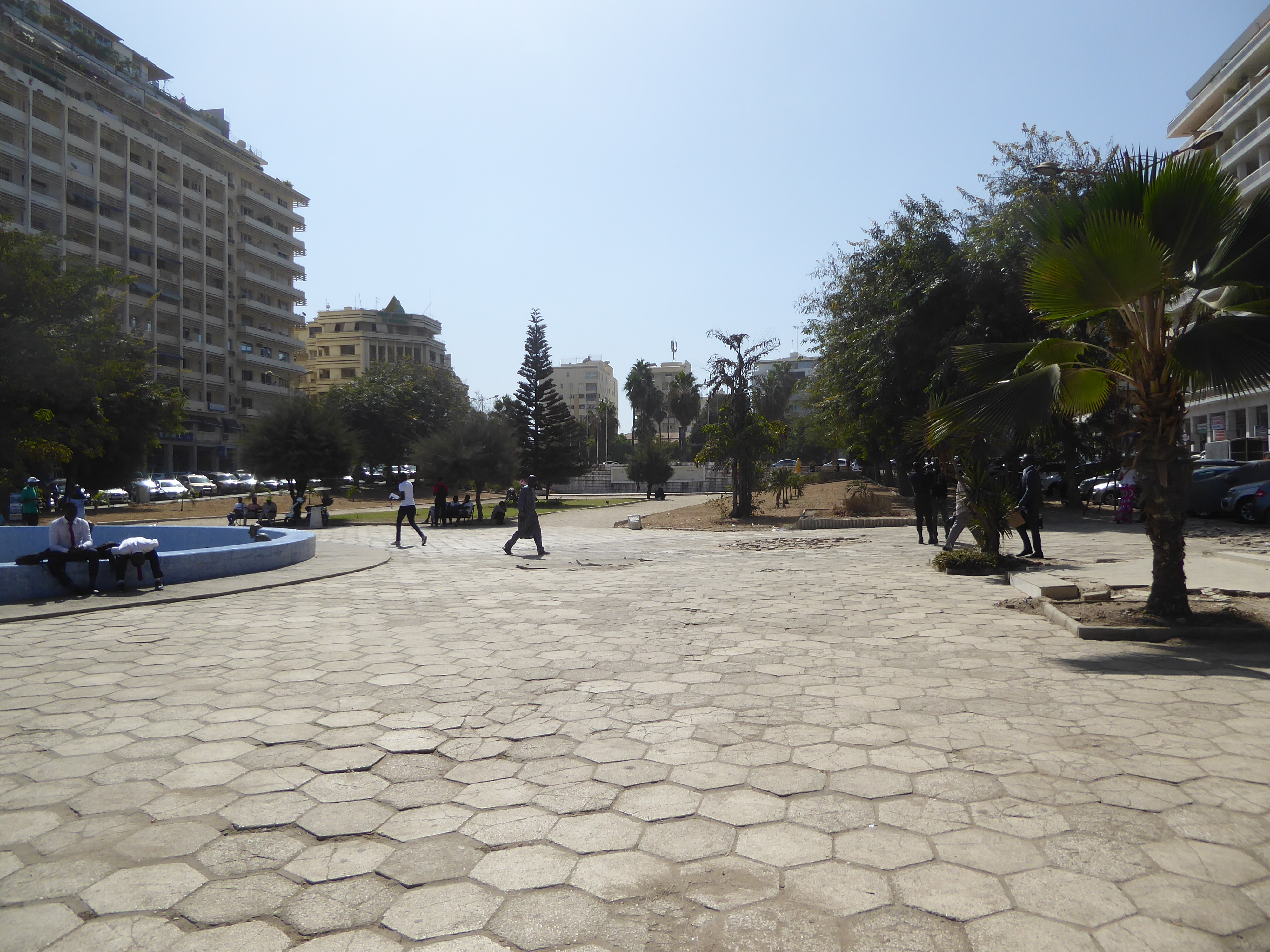 Hardly a ten-minute walk from the harbor, we've made it to the monumental center of Dakar Proper and the focal point of the master plan of 1